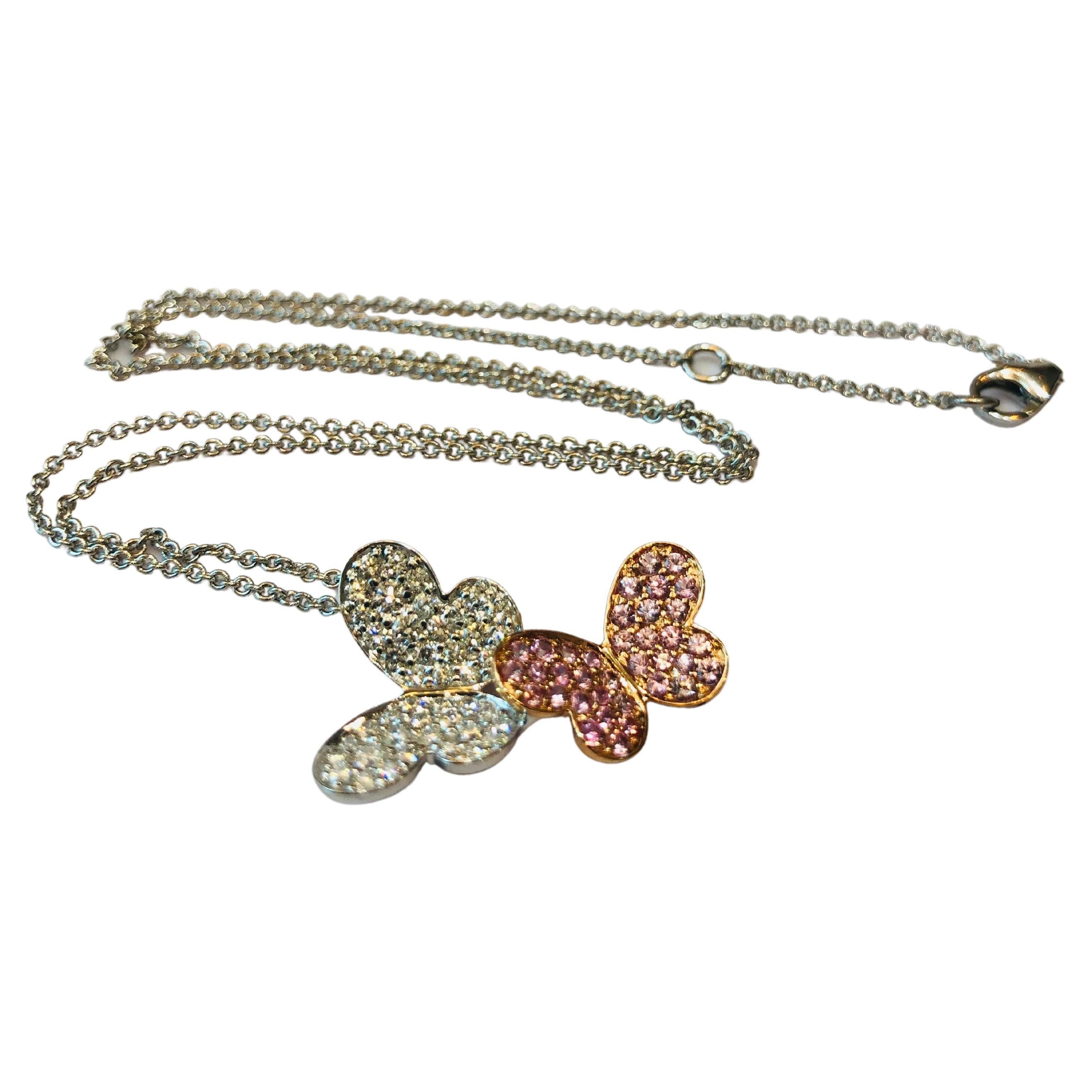Pink Sapphires and Diamonds Butterflies pendant necklace in 18k pink gold 
Sapphires 38 brilliant cut  total 0.81 cts
Diamonds 38 FGVS  brilliant cut 0.45cts 
Gold total 5.05gr
Chain length at 42cm and extra clasp at 38cm

Irama Pradera is a dynamic