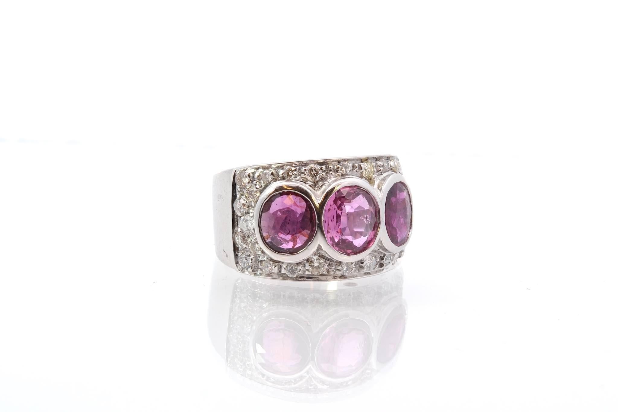 Oval Cut Pink sapphires and diamonds ring in 18k gold