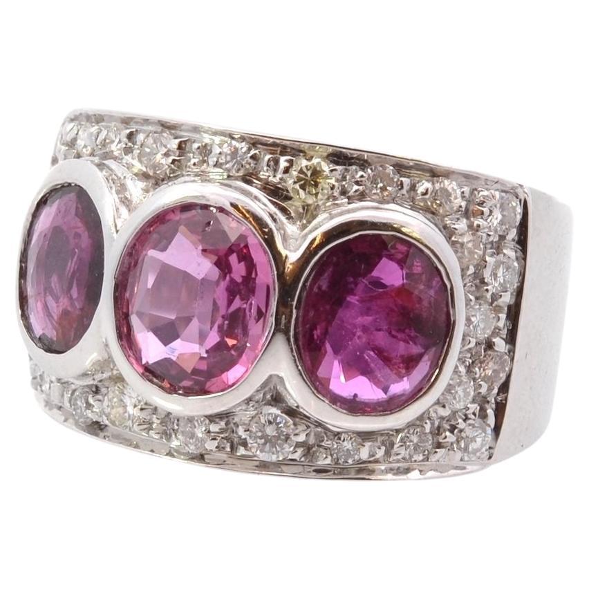 Pink sapphires and diamonds ring in 18k gold