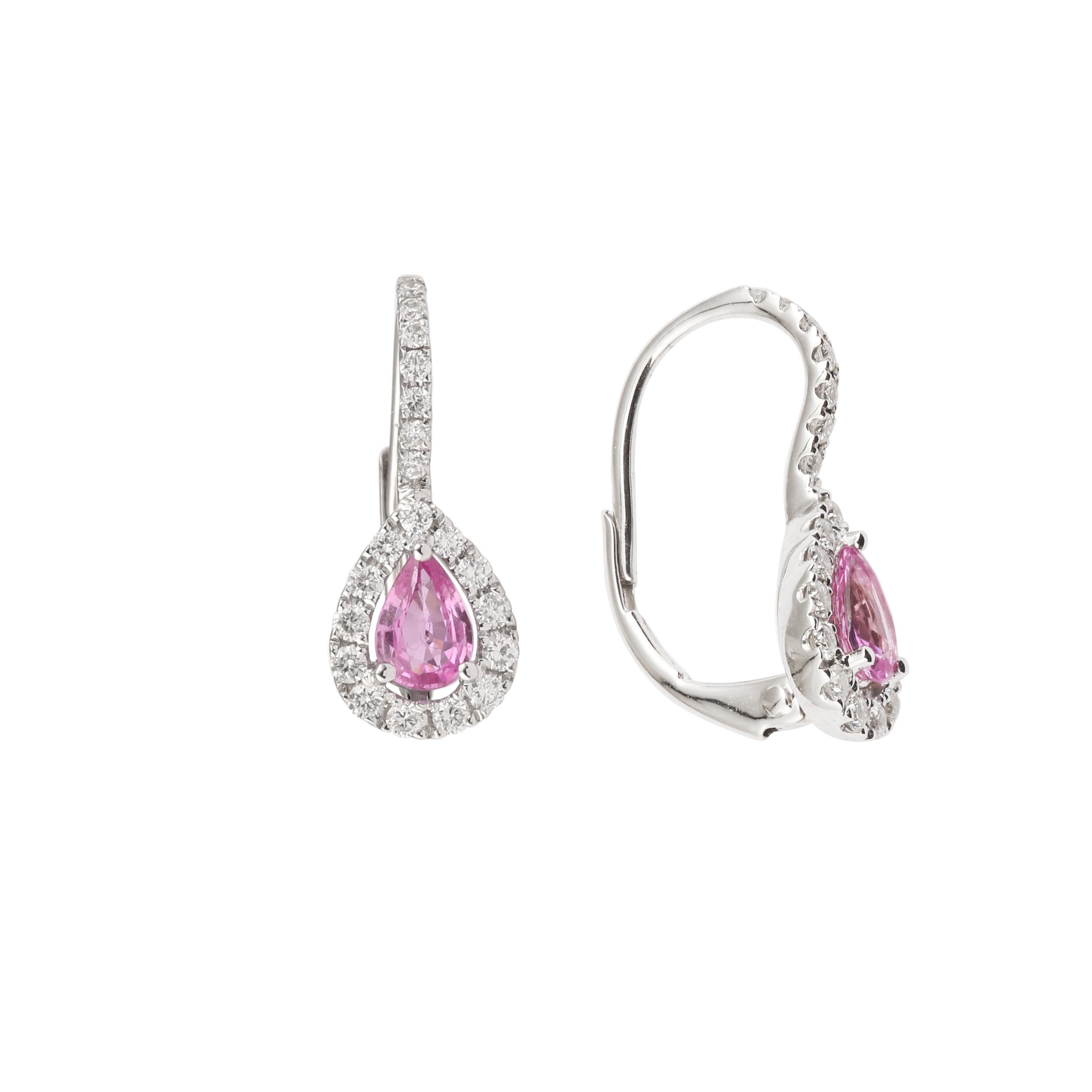 Pair of white gold dormeuses set with pear-cut pink sapphires surrounded by brilliant-cut diamonds.

Total weight of pink sapphires: 0.84 carats

Total weight of diamonds: 0.46 carats

Dimensions : 18.70 x 7.80 x 3.34 mm (0.736 x 0.307 x 0.131