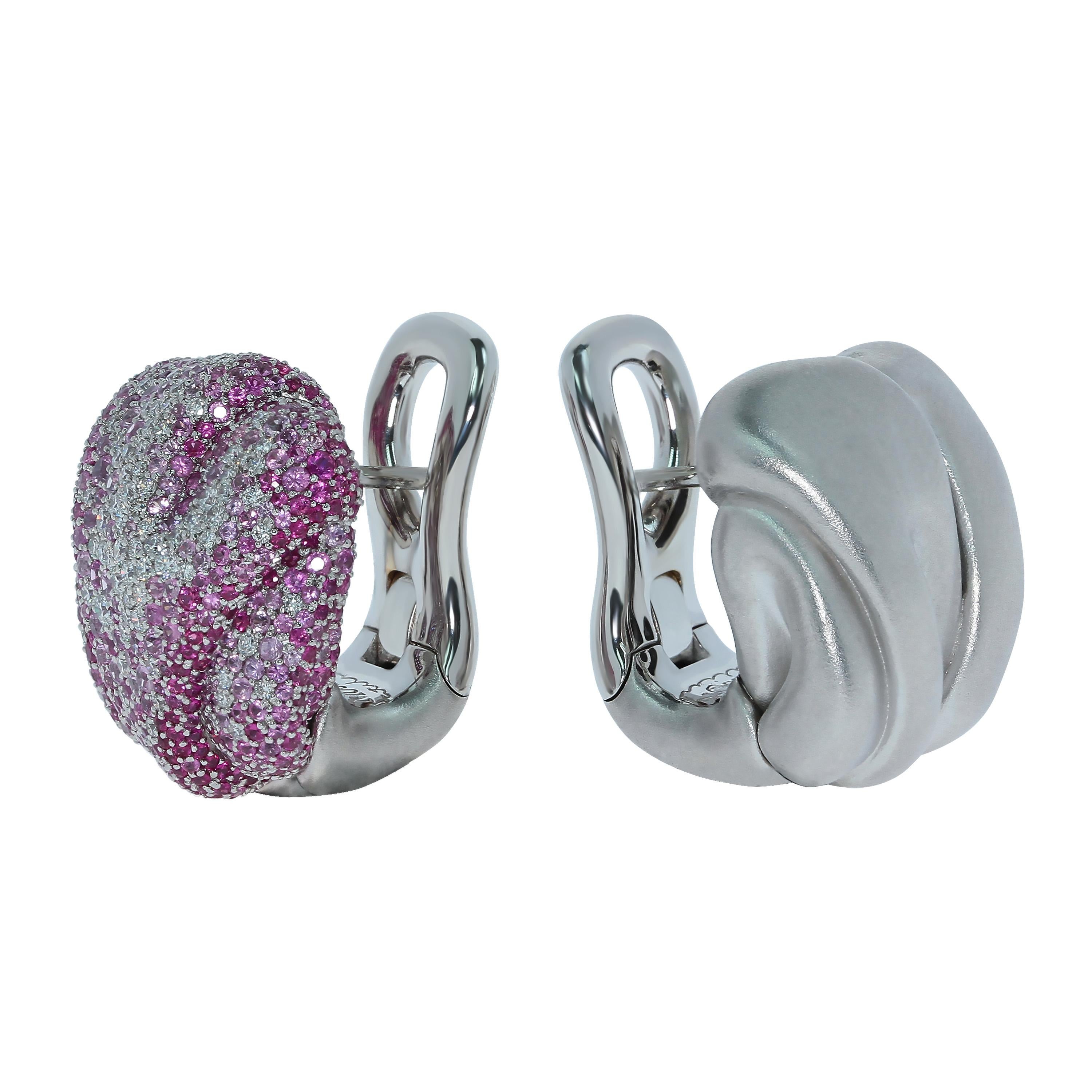 Pink Sapphires Diamonds 18 Karat White Gold Earrings
Our collection is full of different textures and patterns. This time we decided to depict just a piece of crumpled fabric in the Earrings. One Earring is made of 18 Karat Matte White Gold, another