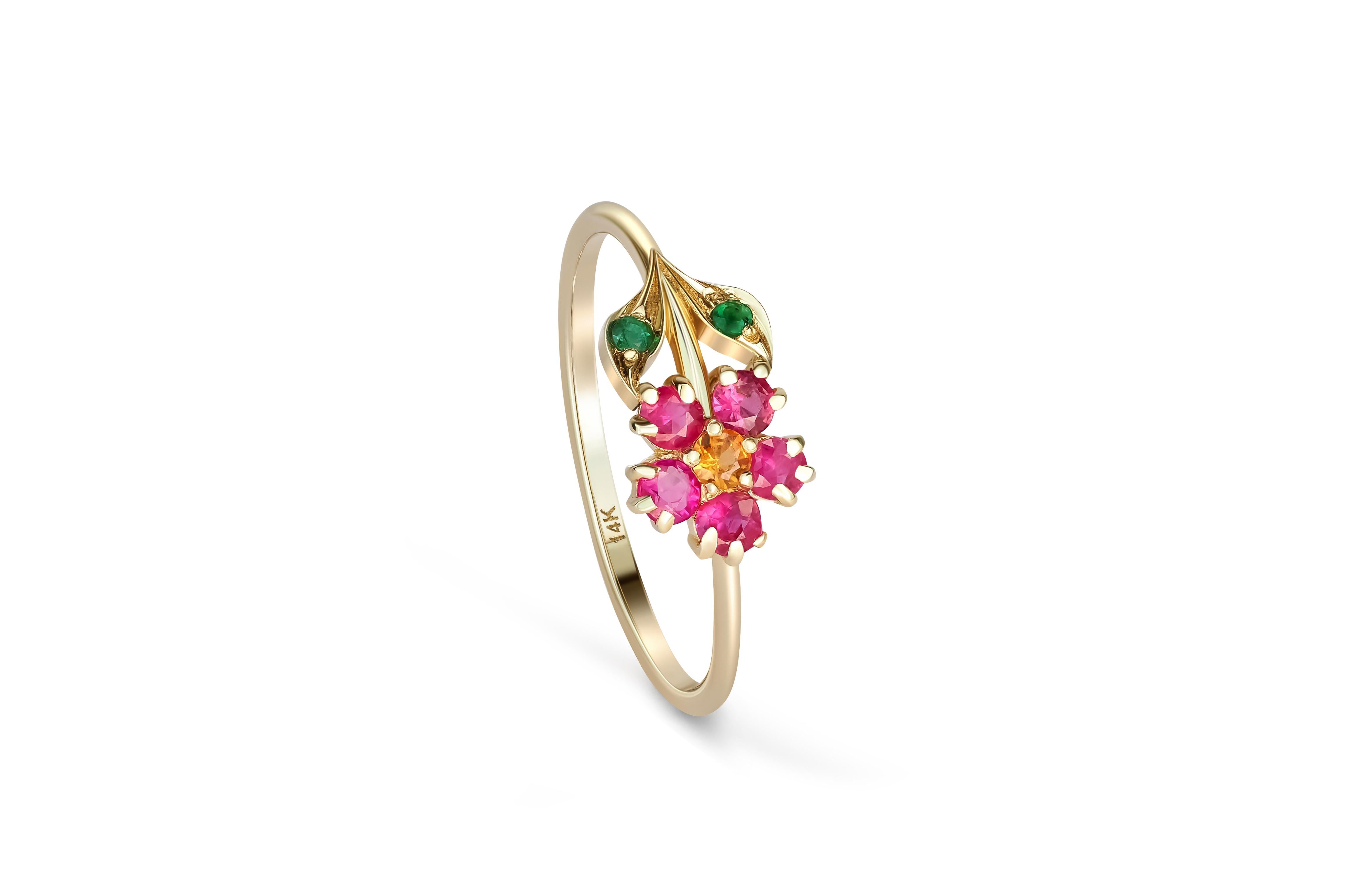 Modern Pink sapphires flower ring in 14 karat gold. 
