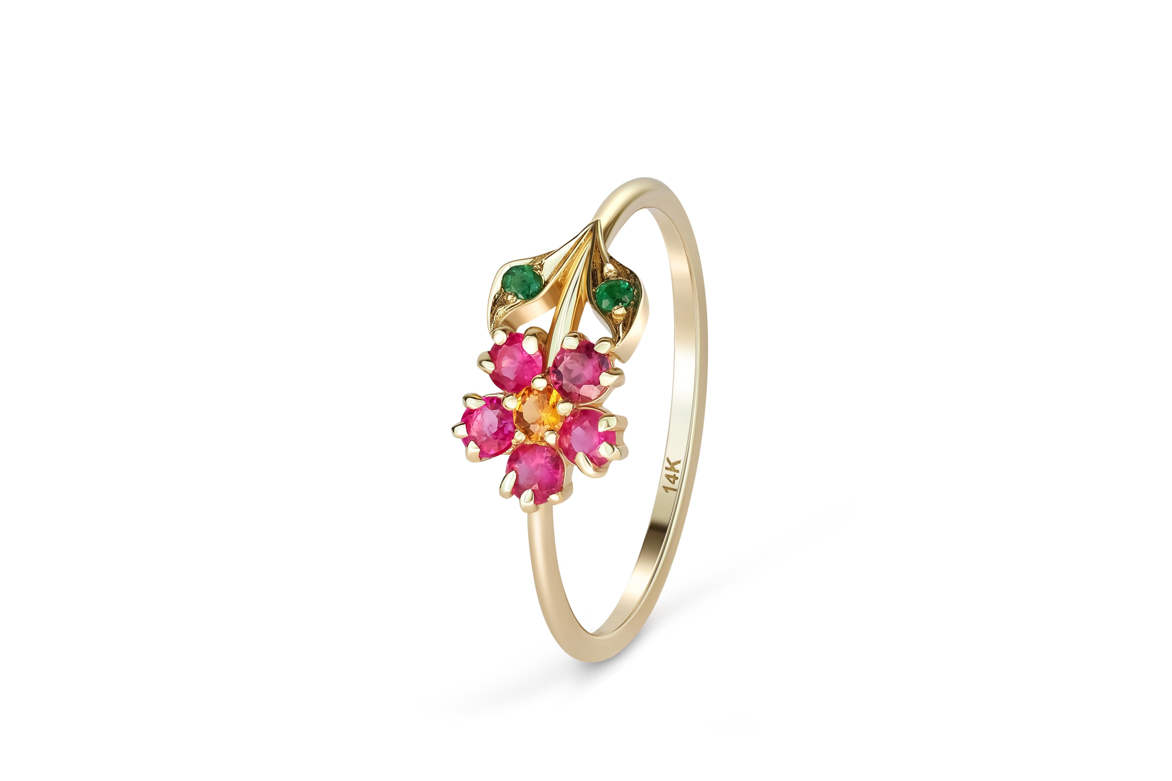Round Cut Pink sapphires flower ring in 14 karat gold. 