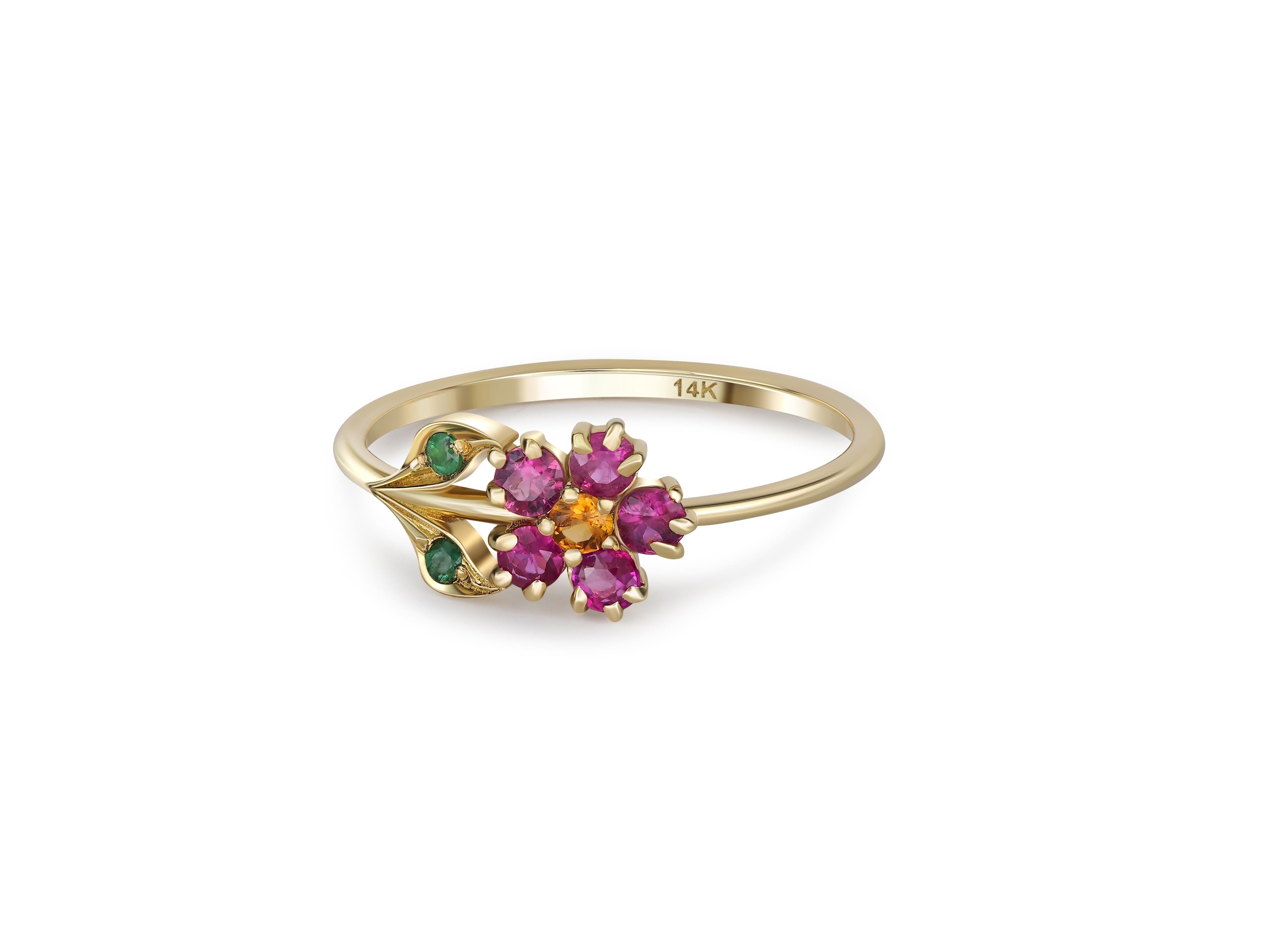 Pink sapphires flower ring in 14 karat gold.  1