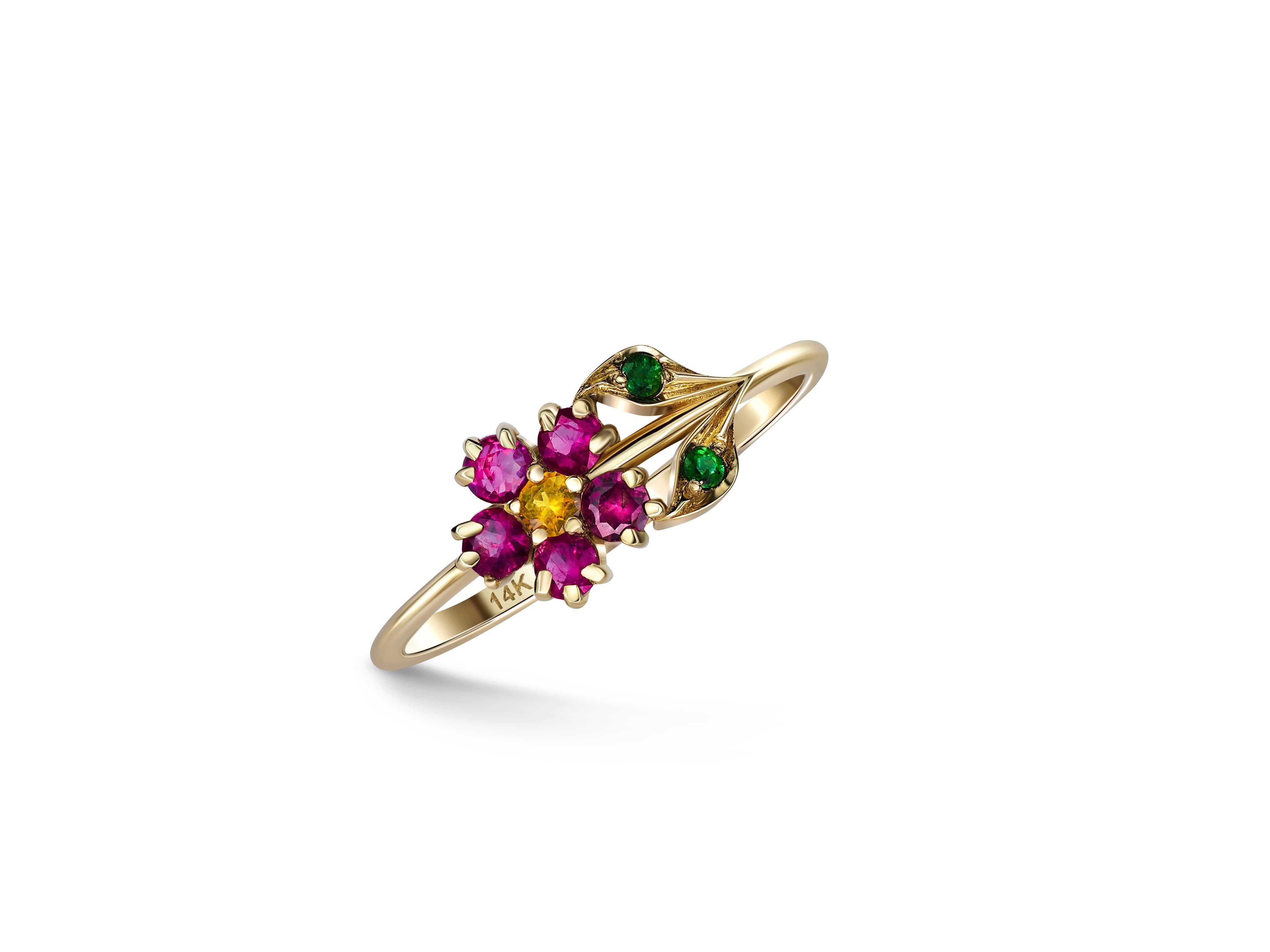 Pink sapphires flower ring in 14 karat gold.  3