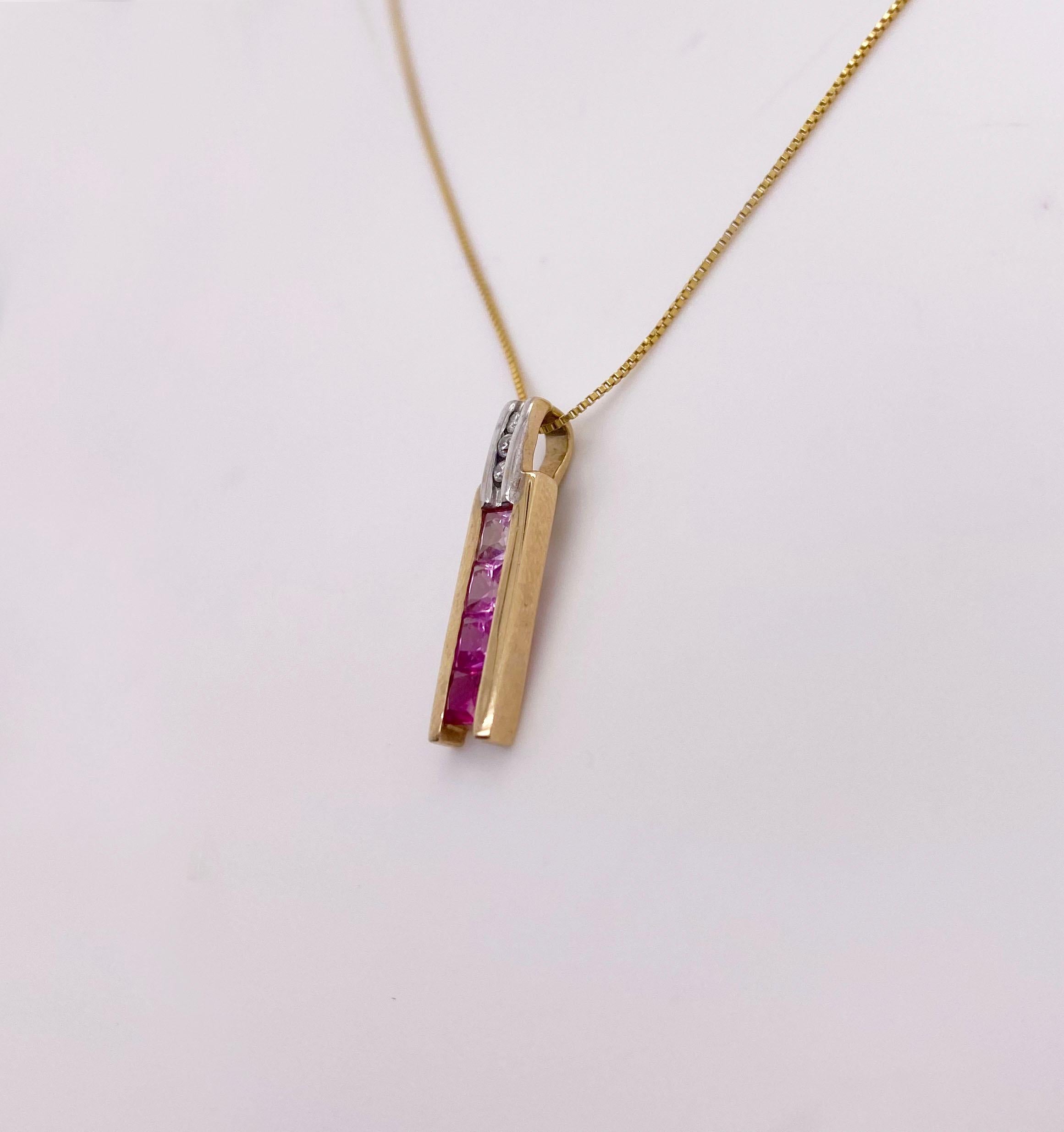 This necklace is gorgeous with it's graduating light pink to dark pink sapphires.
The details for this beautiful necklace are listed below:
Metal Quality: 14 kt Yellow Gold 
Pendant Style: Box Pendant 
Diamond Number: 3 
Diamond Shape: Round