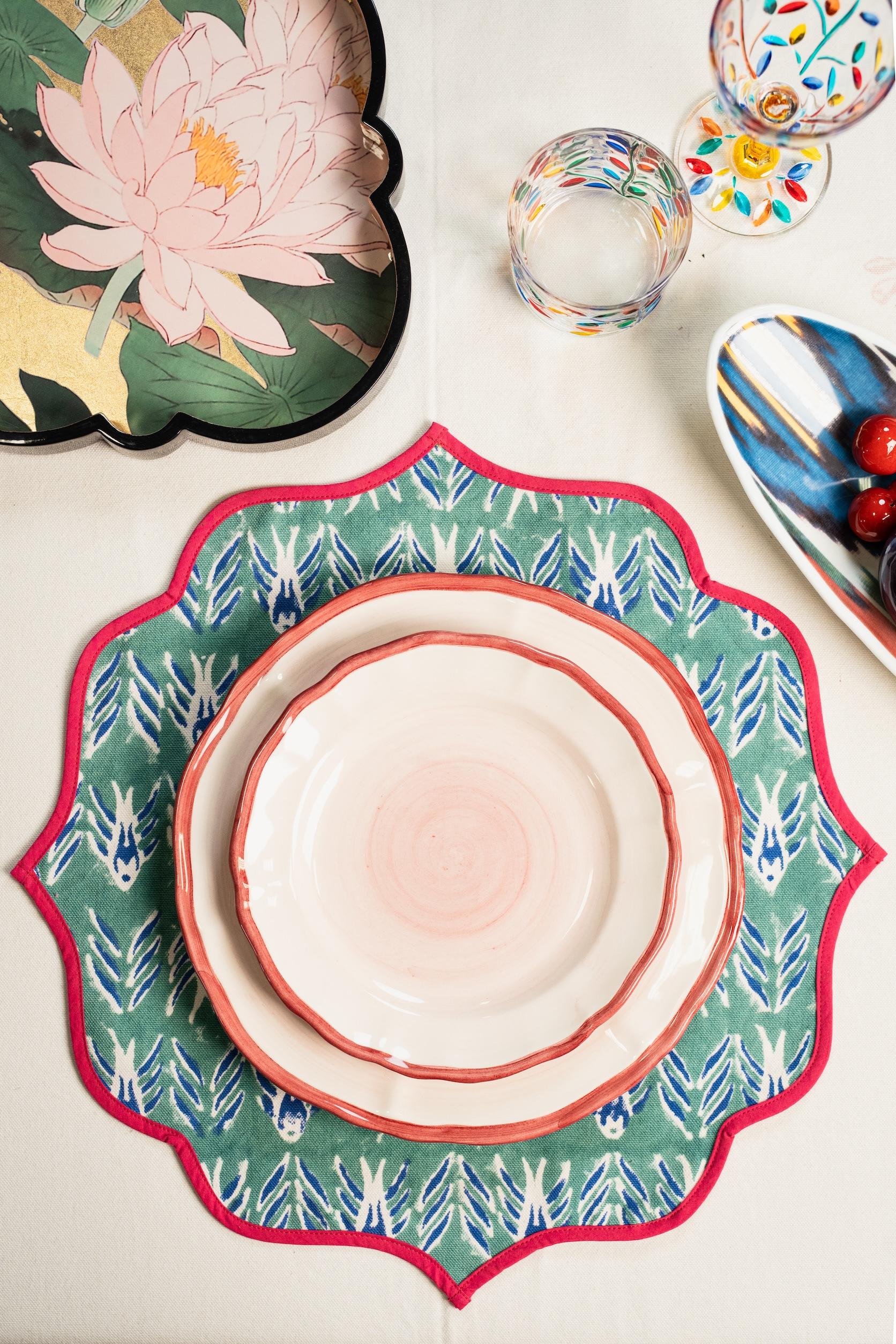 Discover the artistry of Italian craftsmanship with our Hand-Painted Ceramic Plates, featuring a magnificent shaded effect. Available in a range of elegant colors—green, pink, blue, and grey—these plates add a refined touch to any table setting.