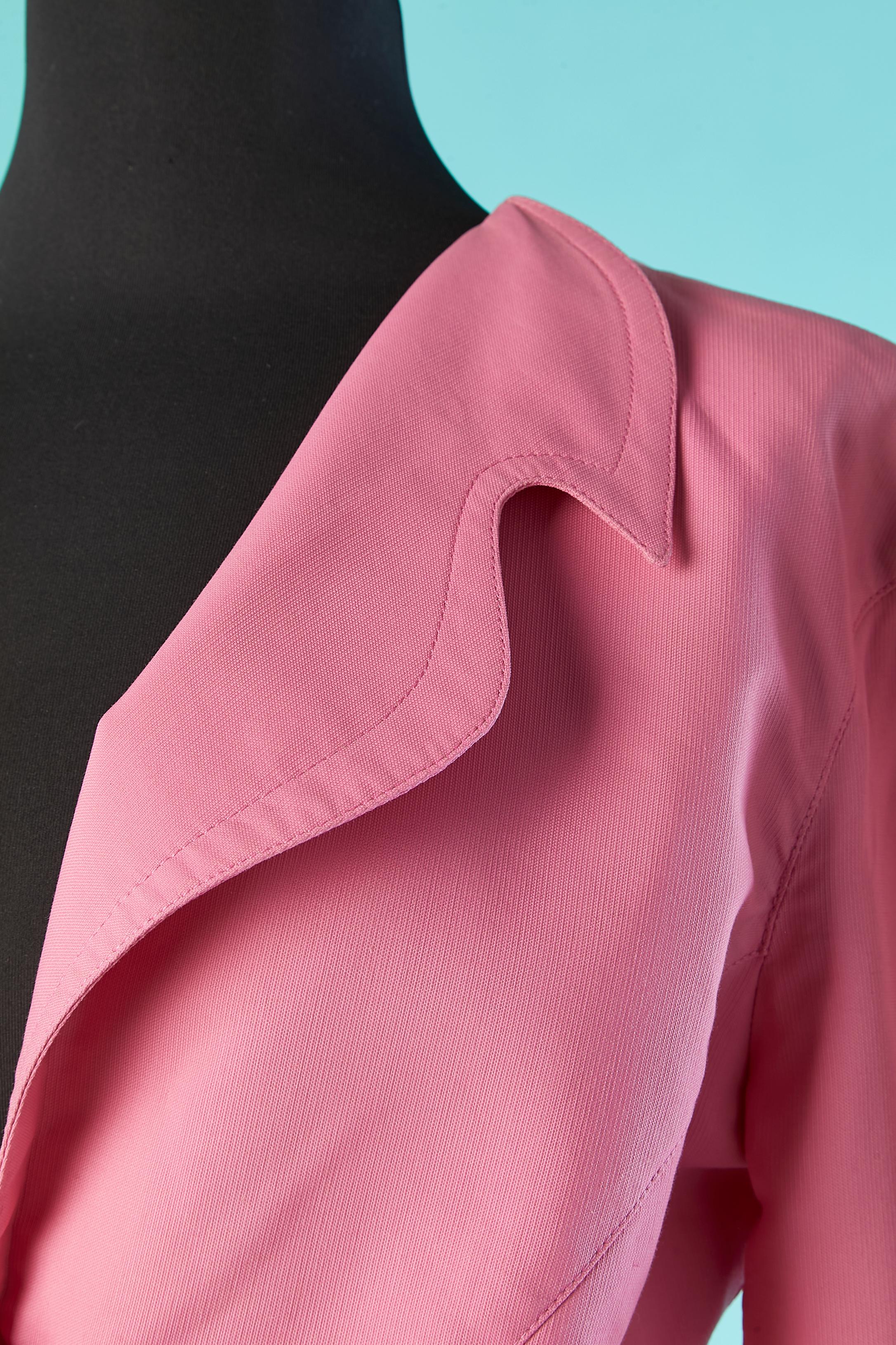 Pink skirt-suit with asymmetrical collar. Main fabric composition: 45% cotton, 55% rayon. No lining. 
Snap closure in the middle front and cut-work. 
SIZE M 
