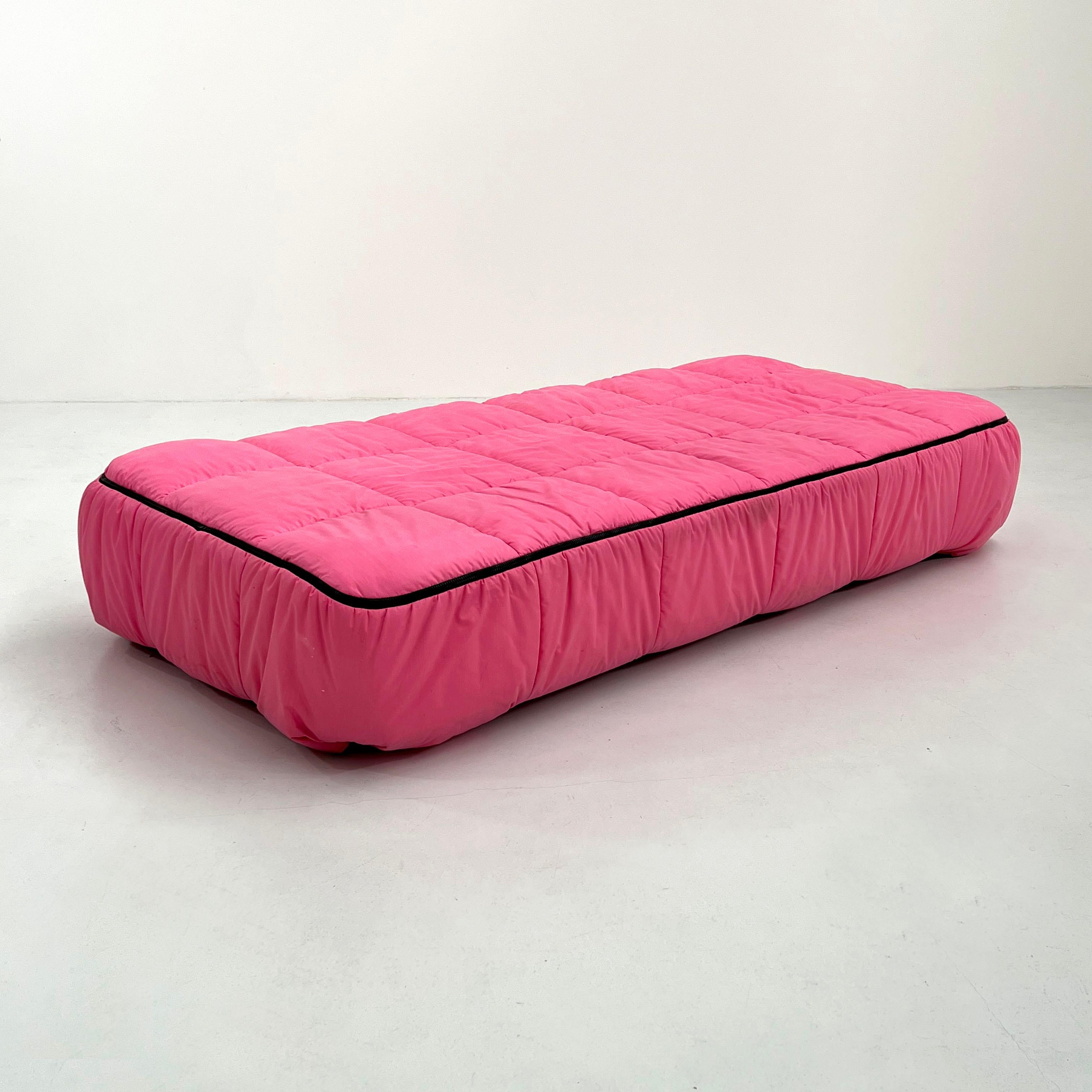 Designer - Cini Boeri 
Producer - Arflex
Design Period - Seventies
Measurements - Width 104 cm x Depth 215 cm x Height 40 cm 
Materials - Fabric
Color - Pink
Comments - Light wear consistent with age and use. Removable covering. New never used