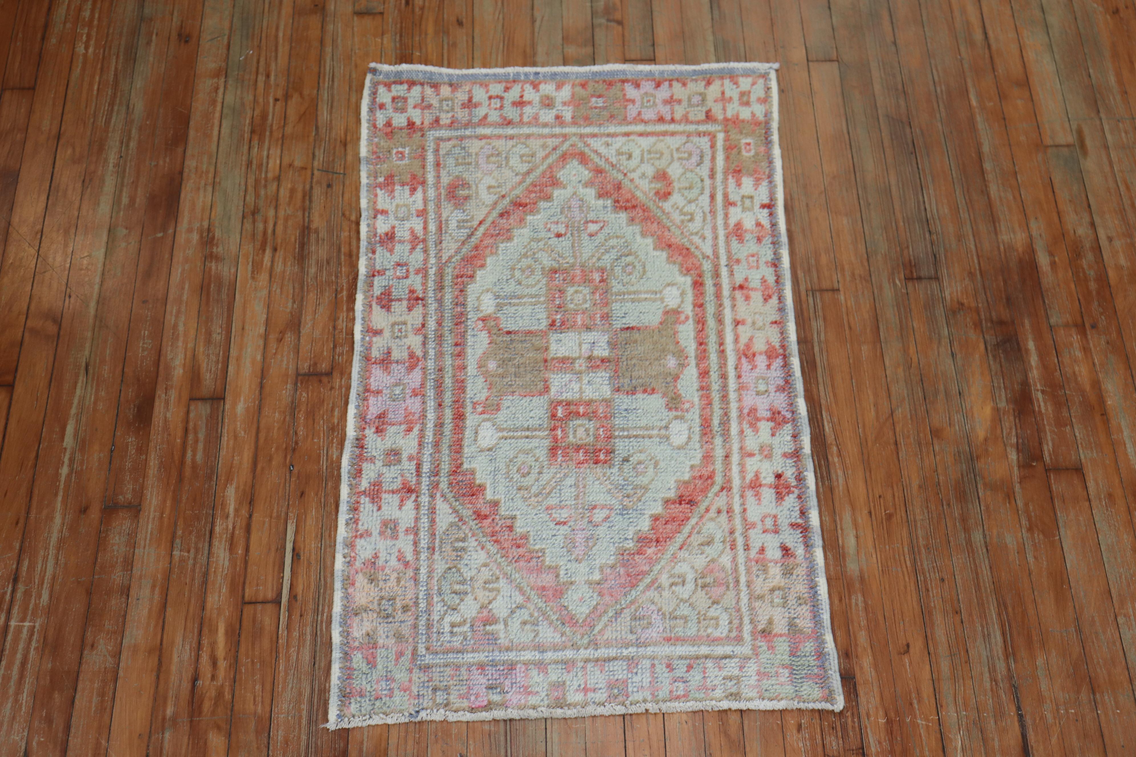 Soft pink coral color midcentury Turkish Anatolian rug.

Size: 2'6