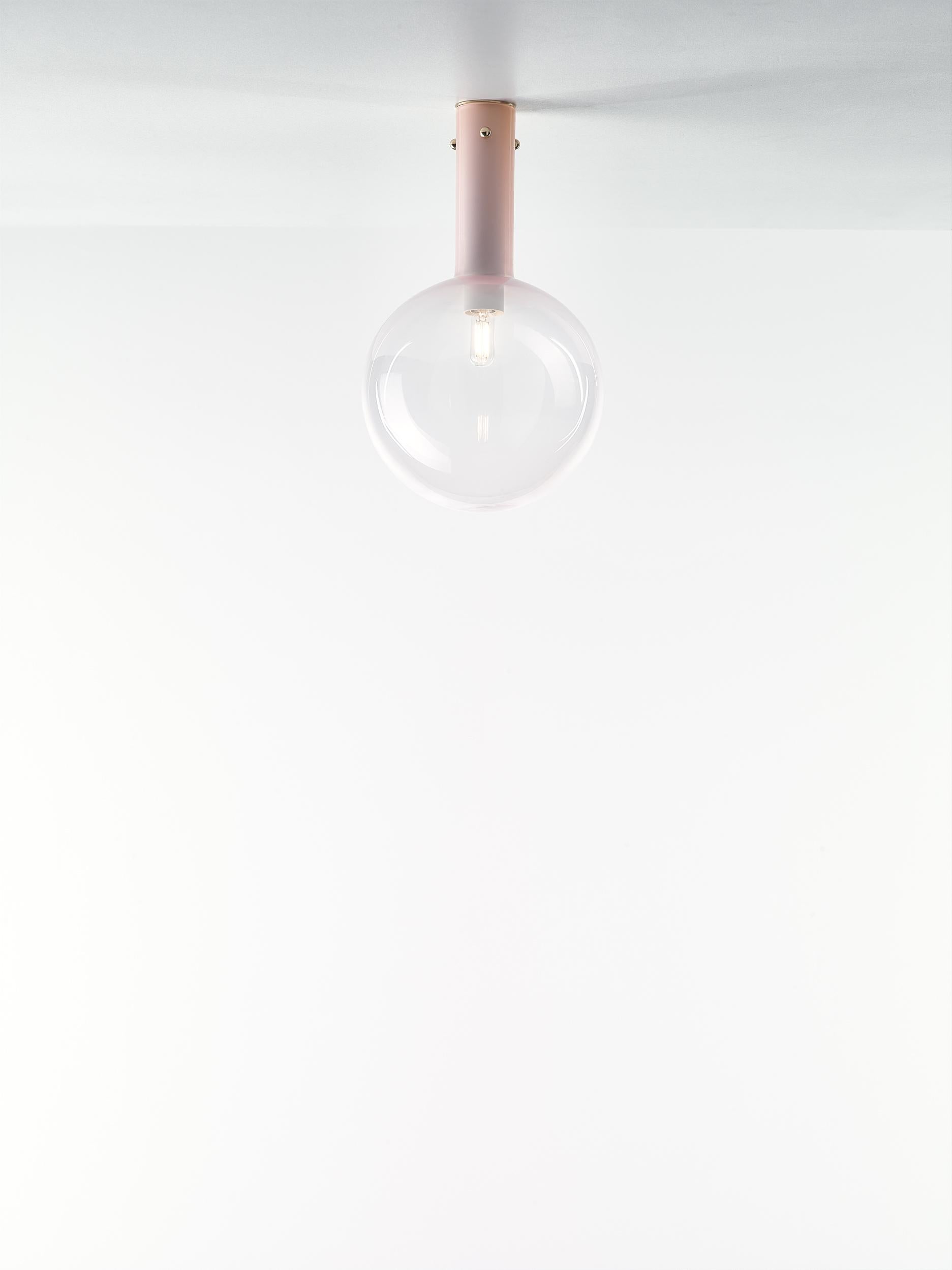 Pink Sphaerae surface light by Dechem Studio
Dimensions: D 20 x H 180 cm
Materials: brass, metal, glass.
Also available: different finishes and colors available.
Only one homogenous piece of hand blown glass creates the main body of Sphaerae