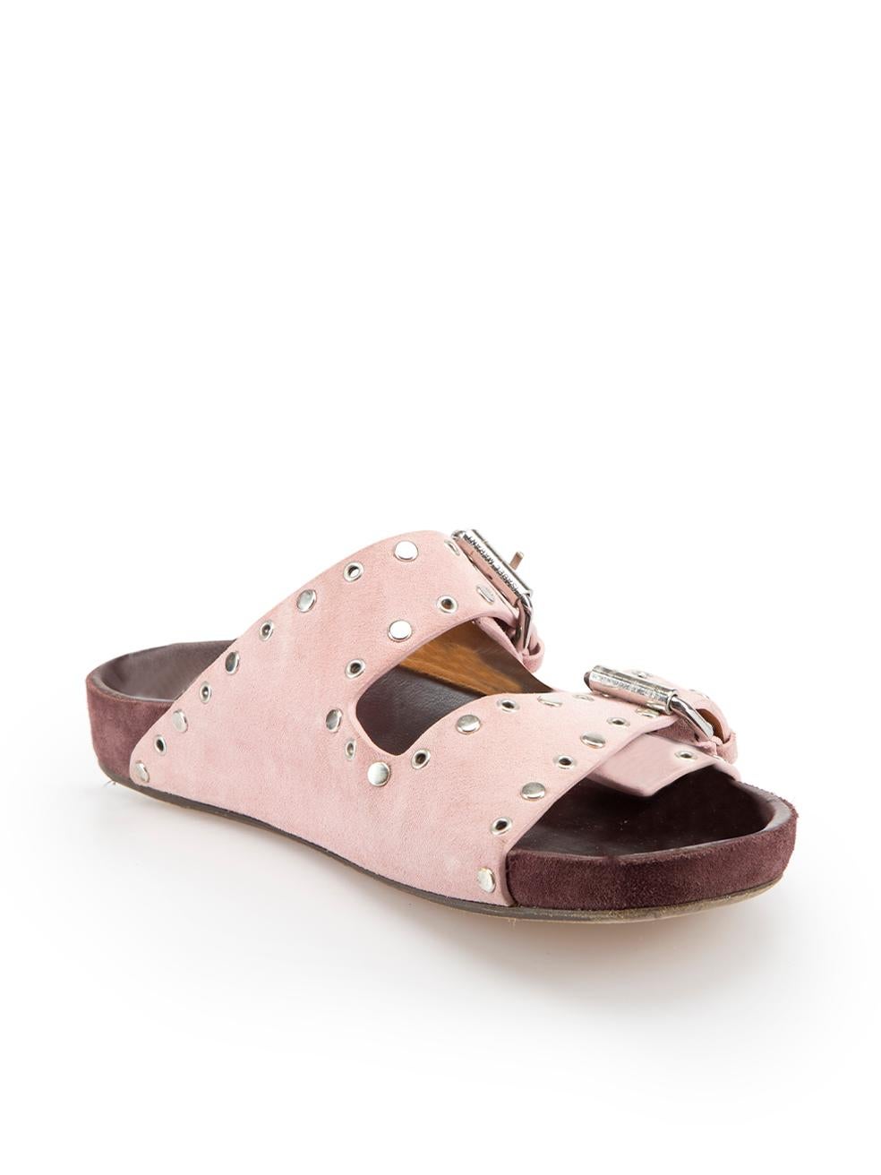 CONDITION is Good. Minor wear to sandals is evident. Light wear to outer sole, slight discoloured marks suede and slight scuffing to suede across straps on this used Isabel Marant designer resale item.



Details


Pink

Suede

Slides

Silver stud