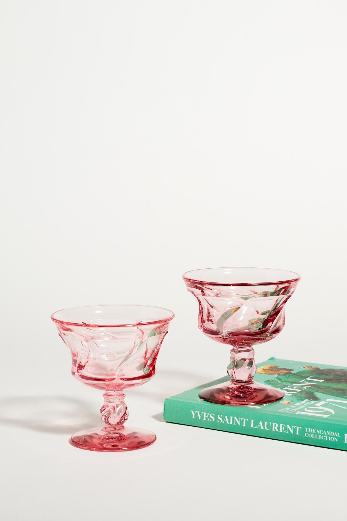 Set of six pink swirled glass goblets in chunky styling.