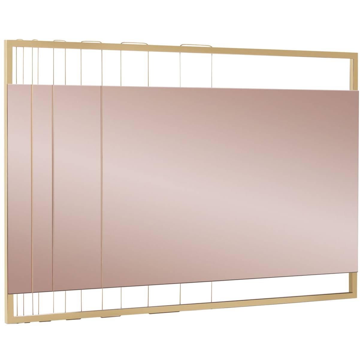 AEGIS-M mirror is made to order using gold stainless steel frame, tinted mirror and gold steel wire. The mirror can be hung vertically or horizontally. A modern contemporary design using only the finest materials and manufacturing methods. Every