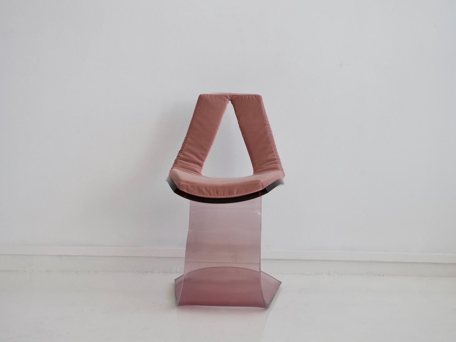 Sculptural chair made of tinted Lucite with new pink velvet upholstery. This 