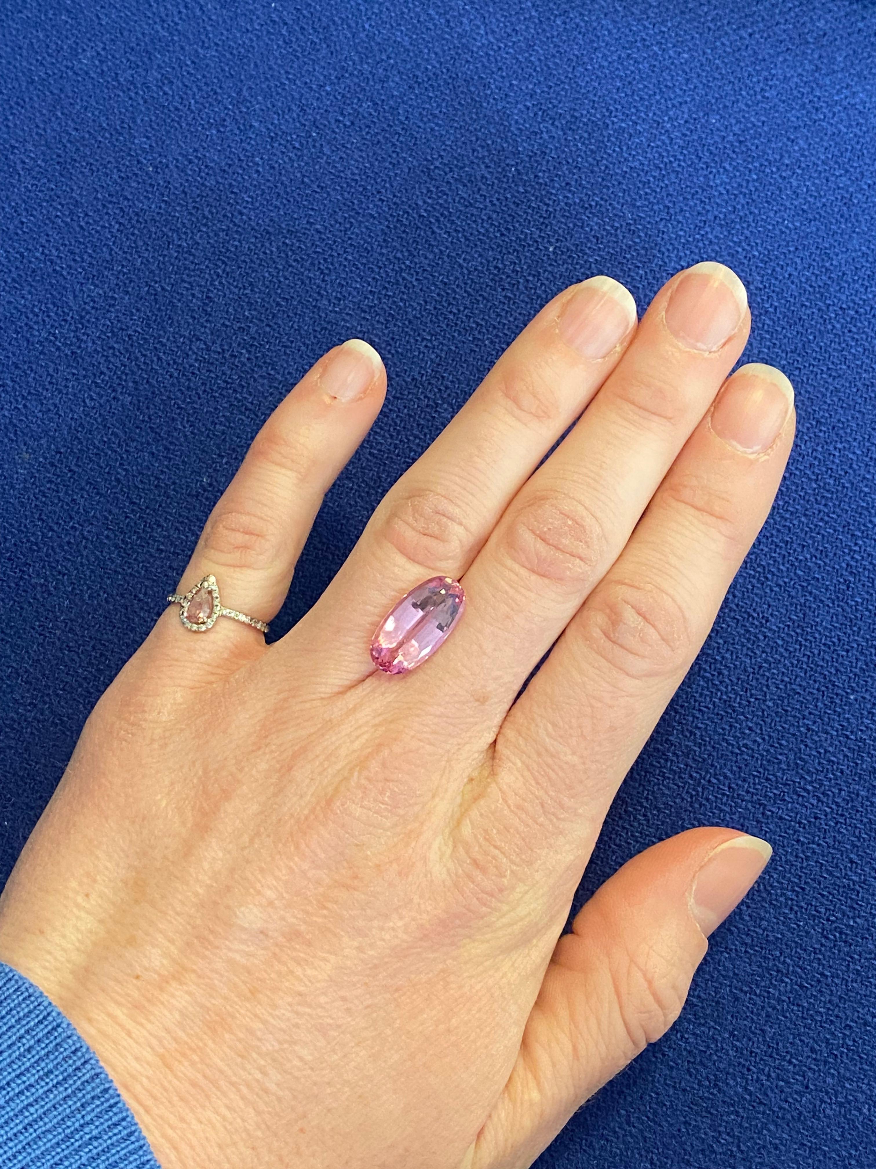 A beautiful Pink Topaz of 8.04 ct. This stone has been recut by a cutter in Geneva to improve the symmetry and facets. This topaz has a GRS certificate stating  that it is a natural topaz which has not been treated. 