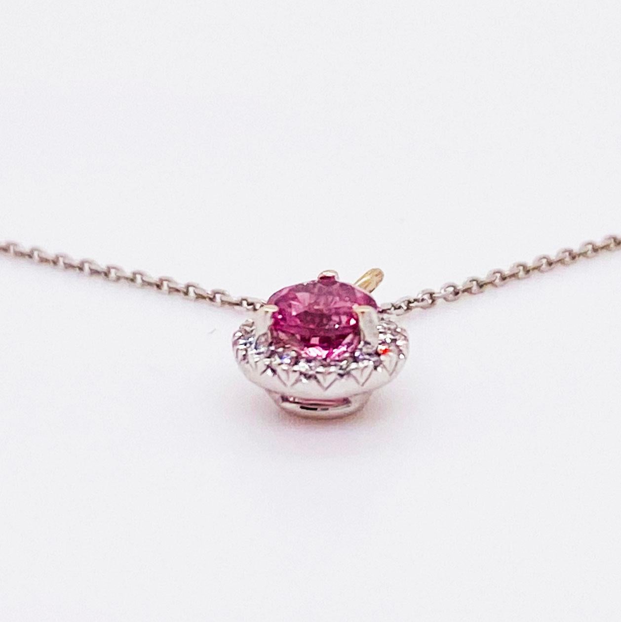 Adorable pink topaz and diamond halo pendant, the perfect gift for any November birthday or anniversary! This sweet pink topaz pendant has a round, genuine pink topaz gemstone set in four prongs with a bright white diamond halo around it. The 15