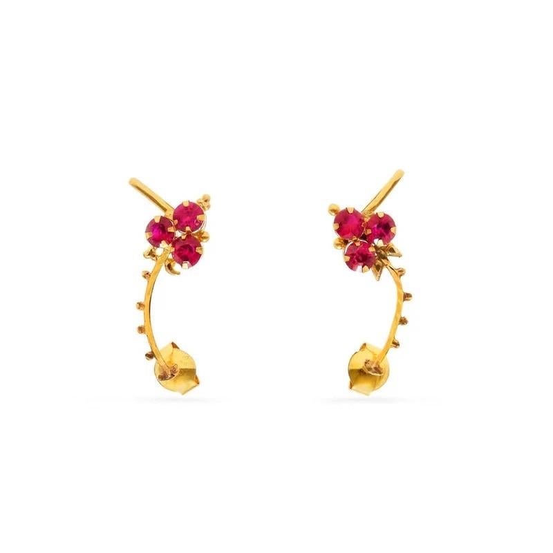 The Pink Topaz Gold Ear Cuffs feature magenta pink topaz handcrafted on-ear climbers inspired by South Indian Temple jewelry design... truly unique and one of a kind.

- Natural magenta pink topaz.
- Set in 22 karat gold.
- For pierced ears with
