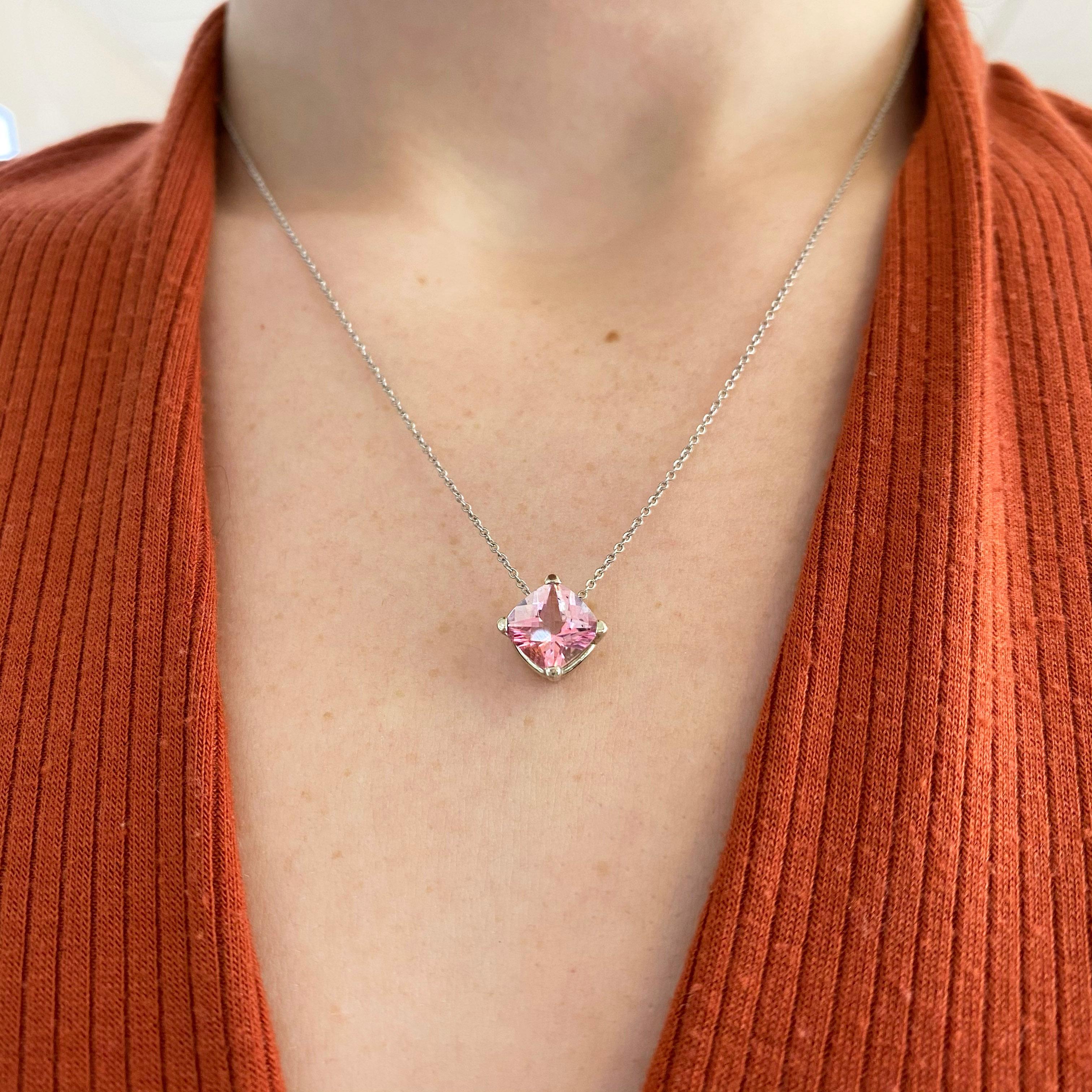 Pink Lover Special! Do you love pink and 14 karat white gold together.  This one of a kind necklace has a cushion cut 1.75 carat genuine pink topaz gemstone set in four prongs.  There is a lovely cable chain in 14 karat white gold.  This looks
