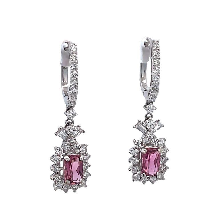 Elevate your style with these exquisite pink tourmaline and white diamond earrings that display elegance and sophistication. Each earring features a high-quality pink cushion tourmaline in the center in 0.98 total carats weight, also a stunning
