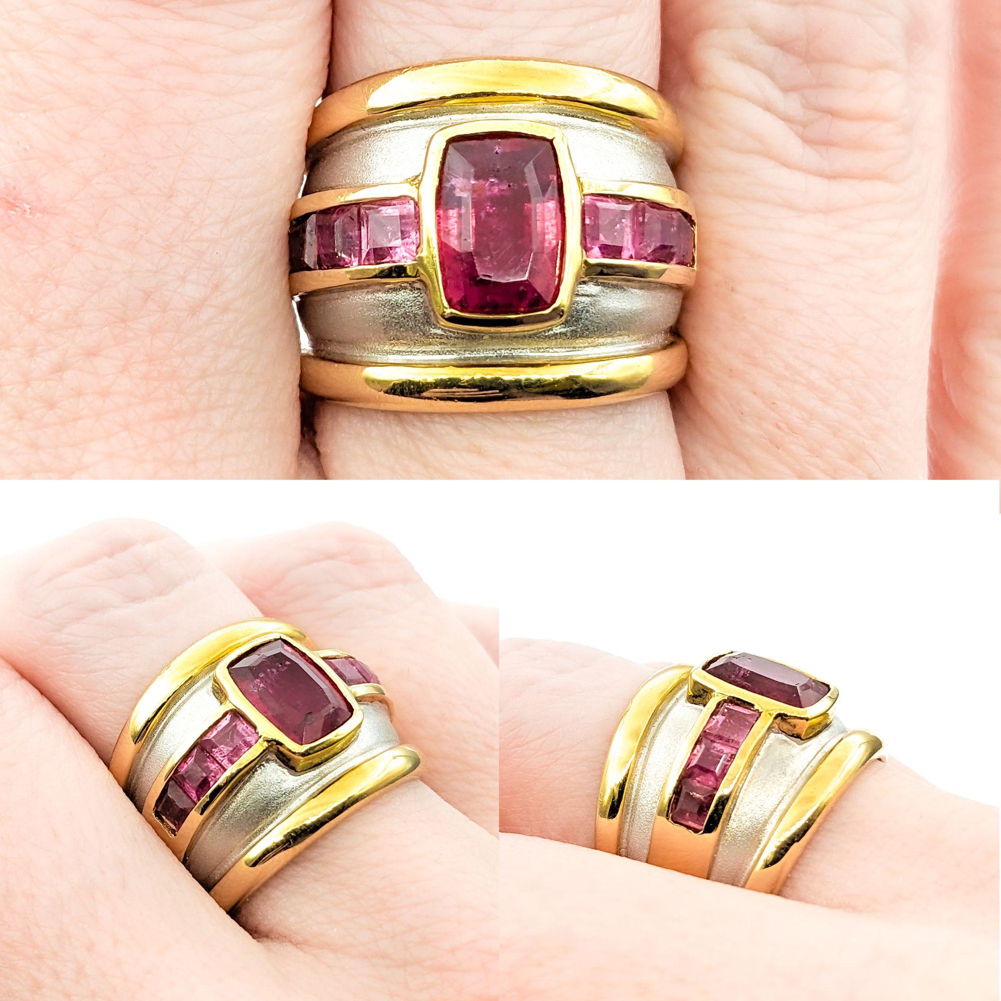 Pink Tourmaline & 14K Two Tone Gold Cocktail Ring

This impressive ring is crafted in 14kt white and yellow gold and features 2.85ct cushion and princess-cut pink tourmalines. This ring is size 7 1/2 but can be adjusted upon request (for a fee);