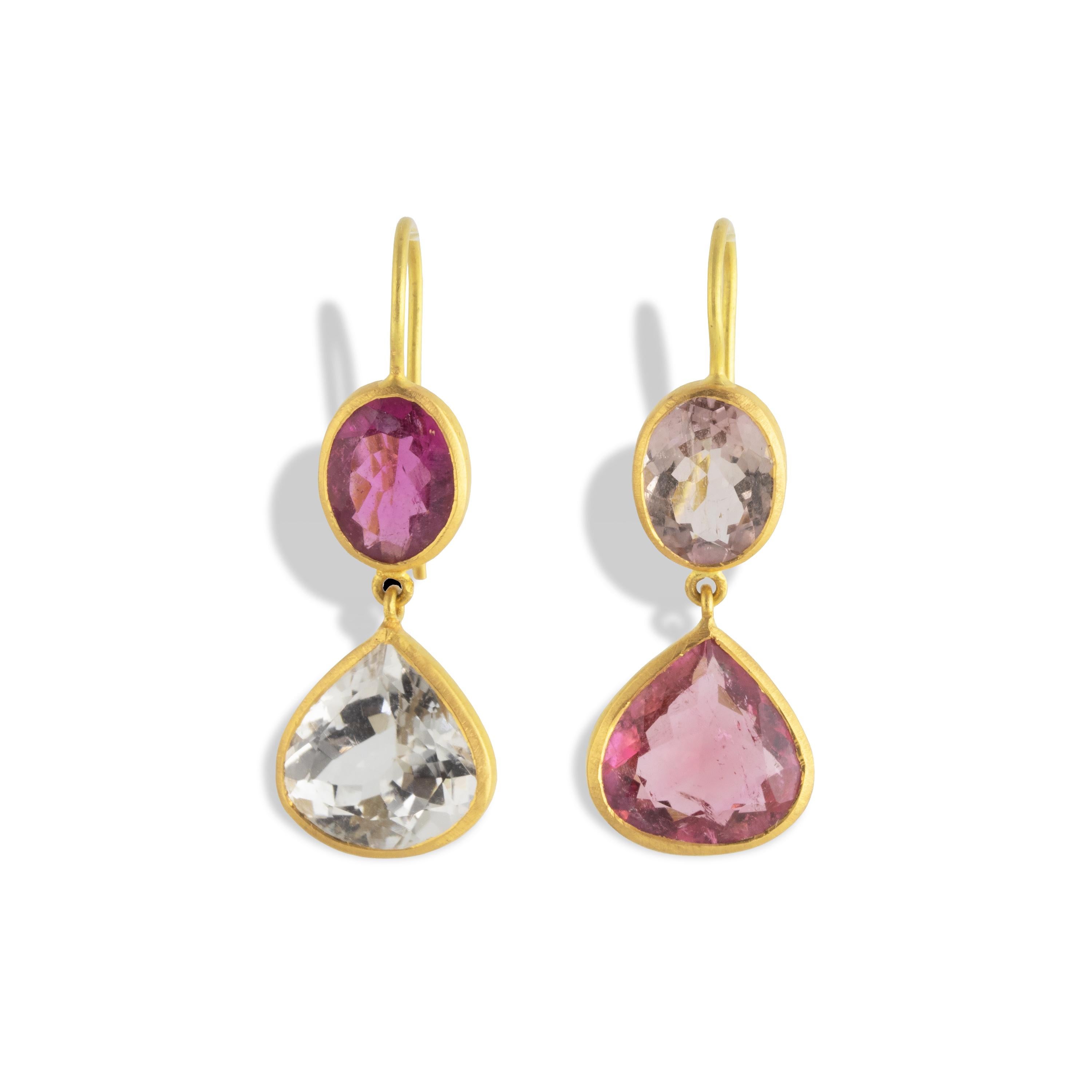 These 22k earrings are made with 8.88 carats of various shades of Pink Tourmaline.  One earring features a rubellite pink tourmaline oval with a light, brownish pink pear shaped drop.  The other earring compliments with an oval light light, brownish