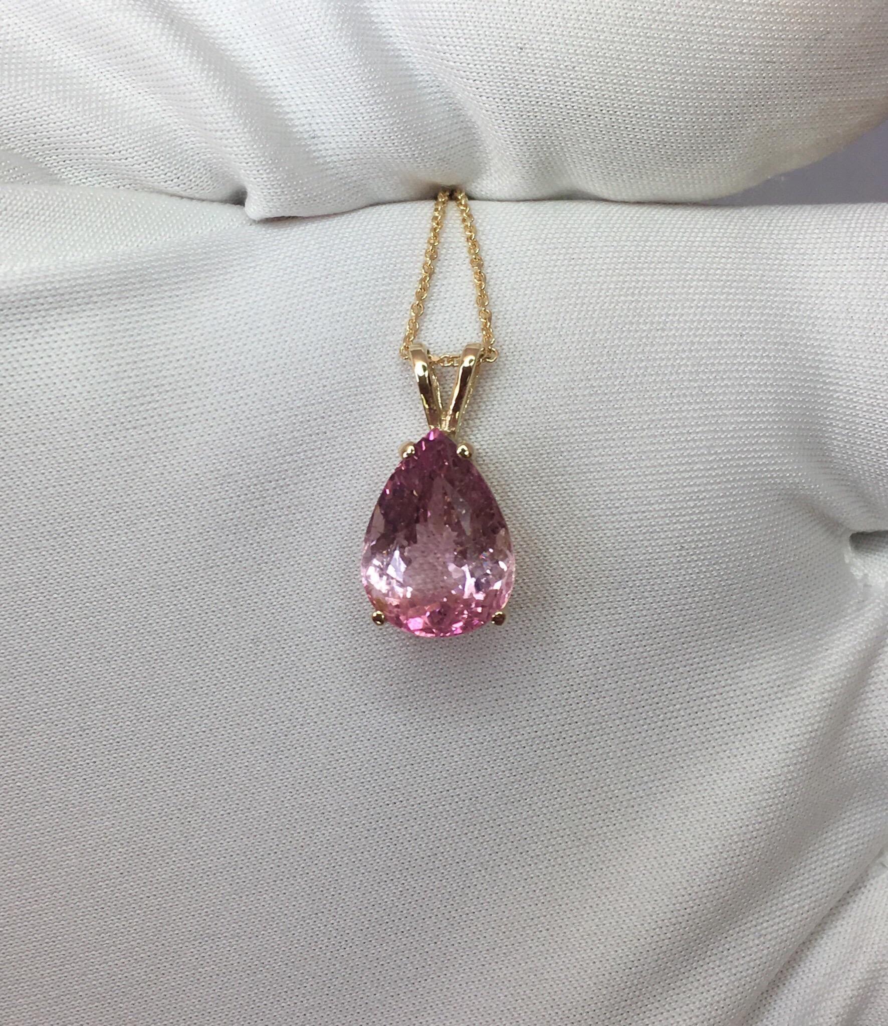 Beautiful large natural 4.17 carat bright pink tourmaline set in a fine 14k yellow gold solitaire pendant.

Stunning tourmaline with a bright pink colour and good clarity, some inclusions when looking closely, but still a clean stone.

It also has
