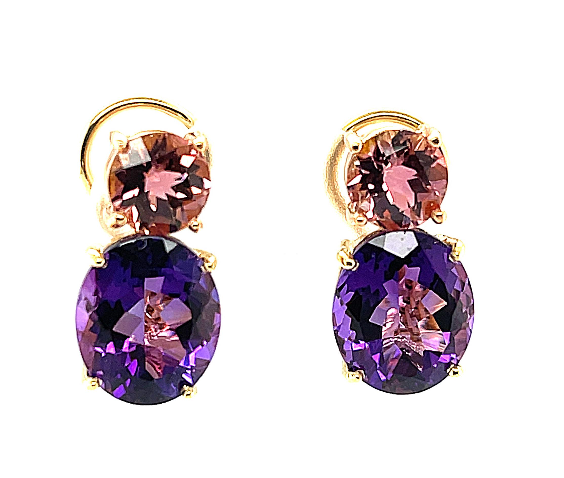 These stunning color blocked earrings feature rosy-pink tourmaline rounds paired with deep purple amethysts ovals. They were handmade in 18k rose and yellow gold by our Master Jewelers in Los Angeles and have French clip backings which make them sit
