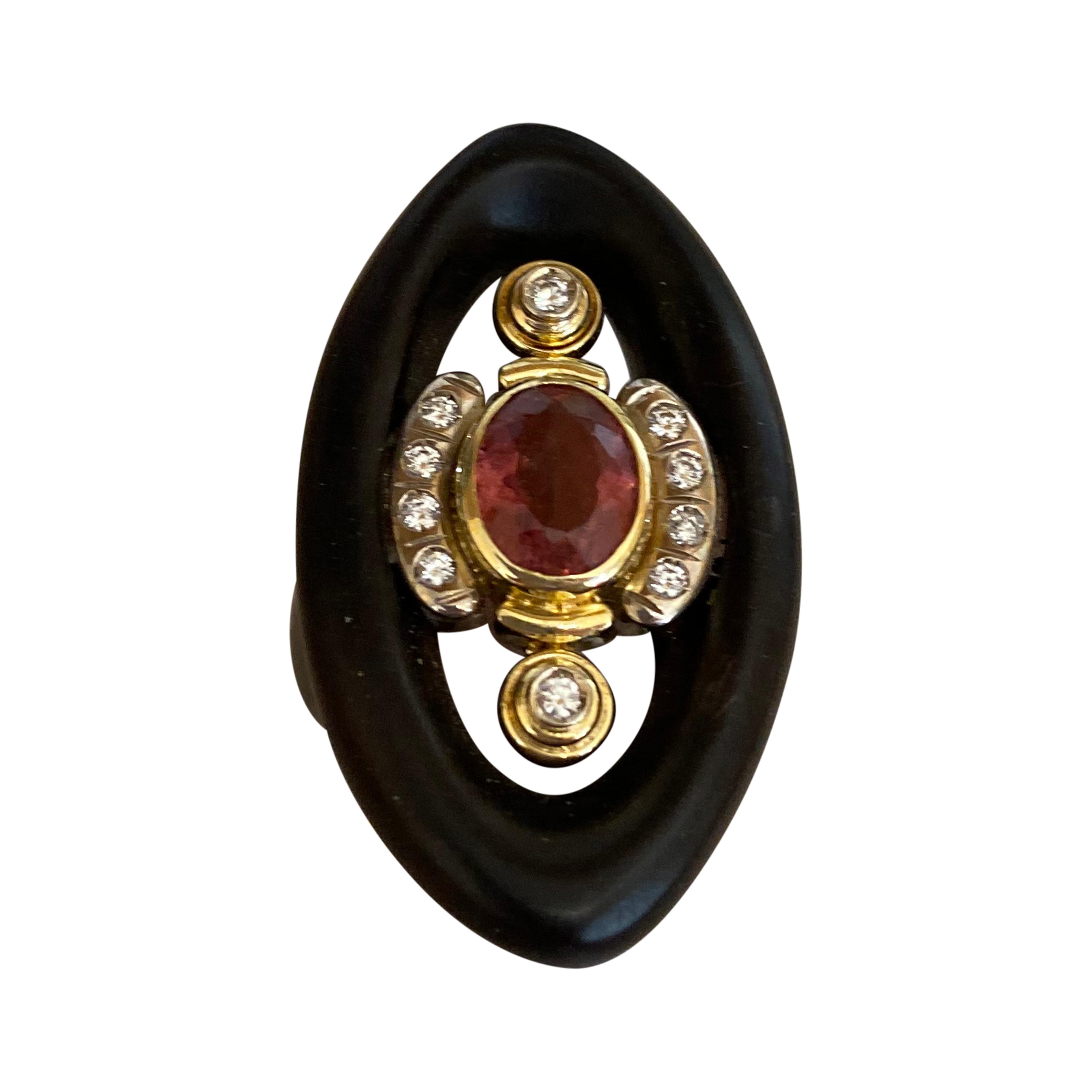 A hand carved gold lined marquise shape Ebony wood Cocktail Ring designed with a faceted pink Tourmaline center and diamonds around. Set in 18 karat yellow gold, signed Sorab & Roshi. FS-7.5
PT=2.65 cts., Dia=0.35 cts.