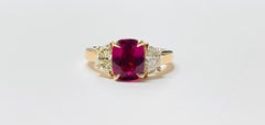 Pink Tourmaline And Diamond Engagement Ring In 14 Karat Yellow Gold.
