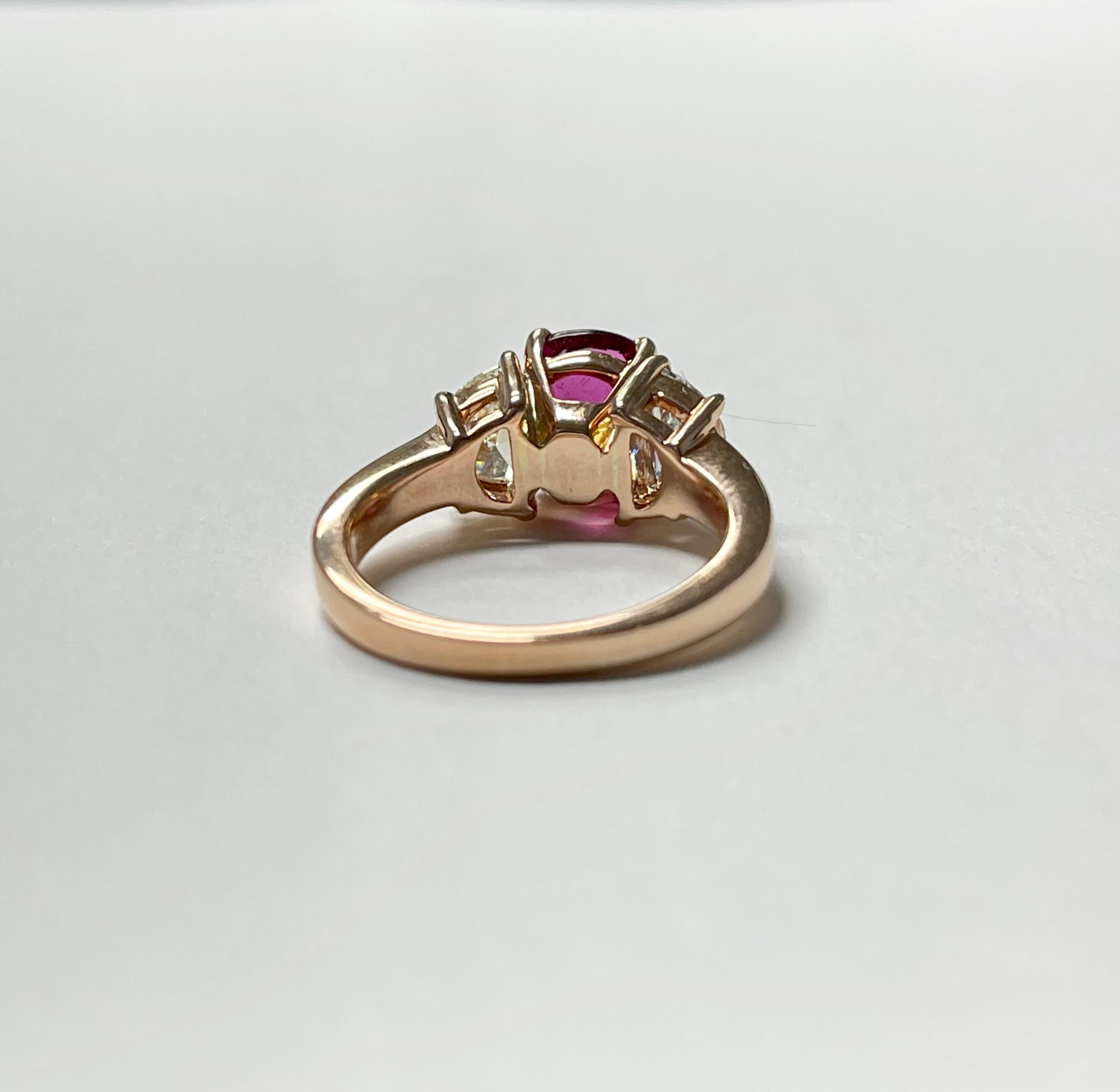 Pink tourmaline and diamond engagement ring handcrafted in 14 k rose gold. 
The details are as follows : 
Pink tourmaline weight :2.02 carat 
Light Yellow Diamond weight : 1.05 carat 
Metal : 14 k rose gold 
ring size : 6 1/2 
