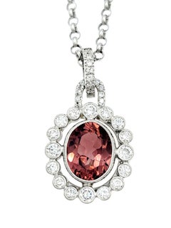 Oval Pink Tourmaline and Diamond Halo Pendant Necklace in 14 Karat White Gold