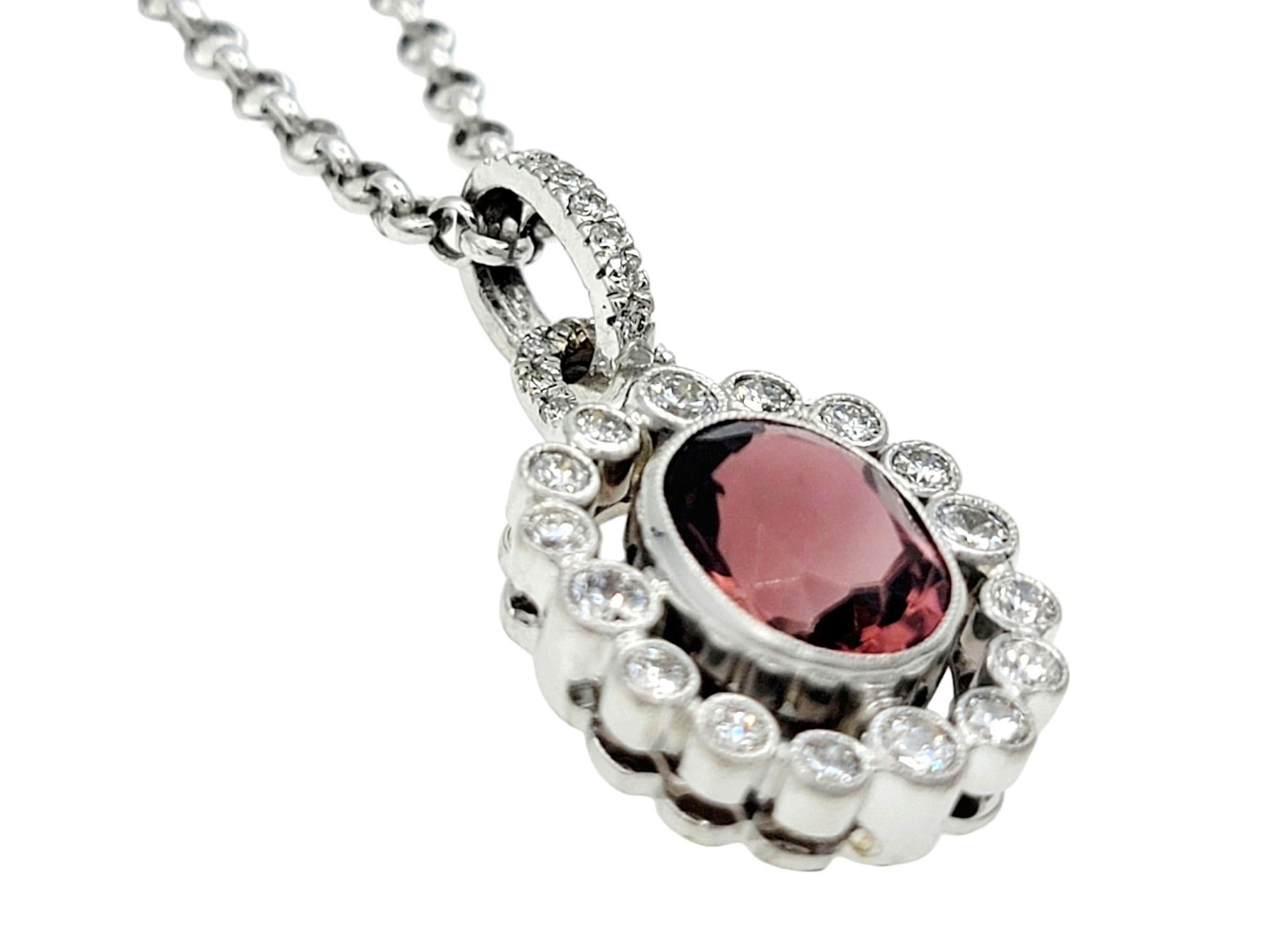 Contemporary Pink Tourmaline and Diamond Halo Drop Pendant Necklace in 14 Karat White Gold For Sale