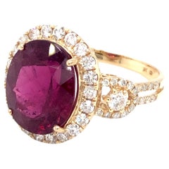 Ring aus 14 Karat Gelbgold mit rosa Turmalin und Diamant