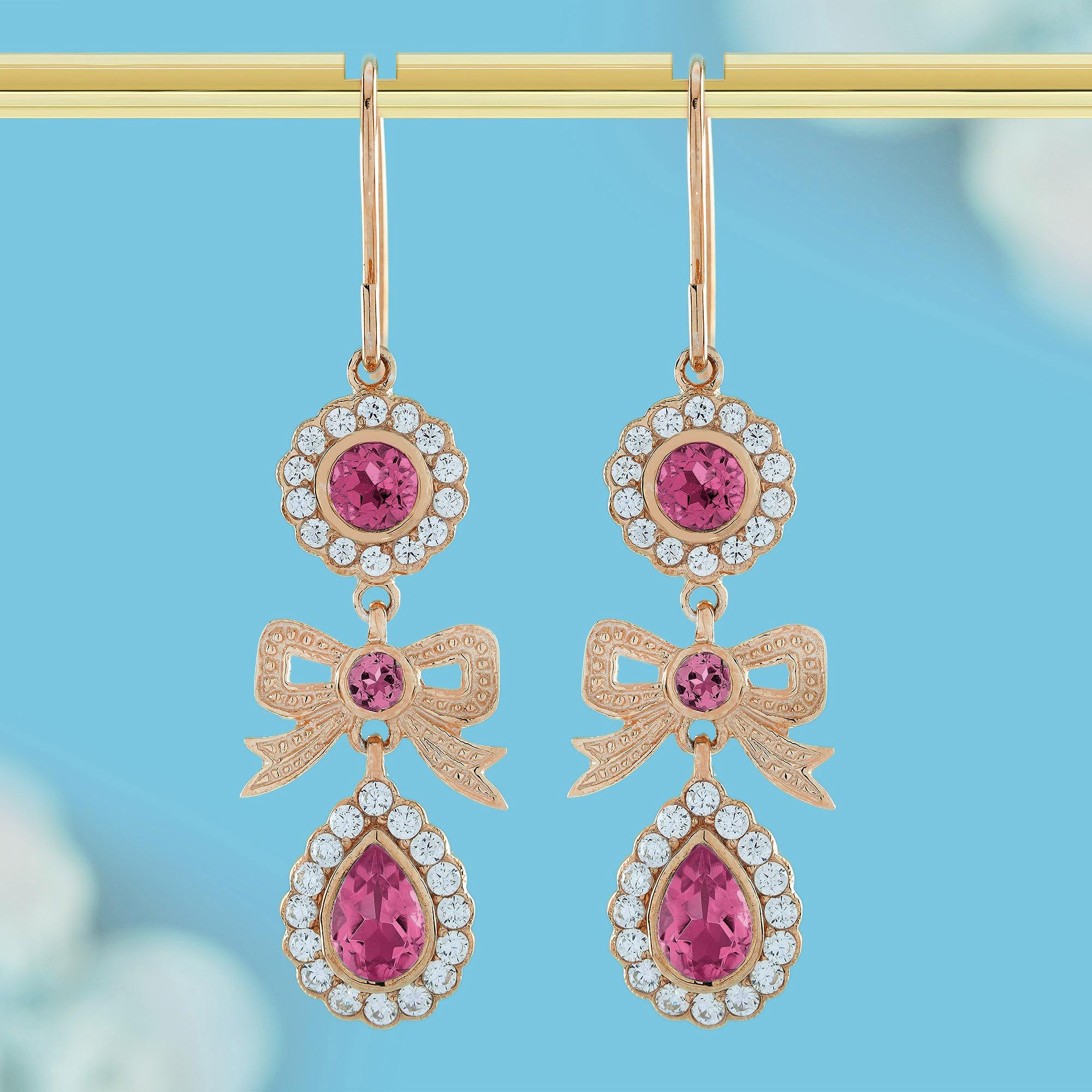A charming blend of elegance and femininity. The soft, blush pink tourmaline gemstones at the heart of each earring exude a sense of warmth and love, symbolizing compassion and joy. Their radiant color catches the light, creating a subtle yet