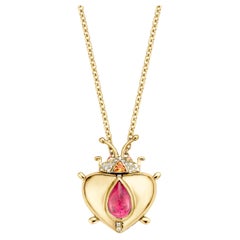 Collier pendentif médaillon en or jaune avec tourmaline rose et diamants