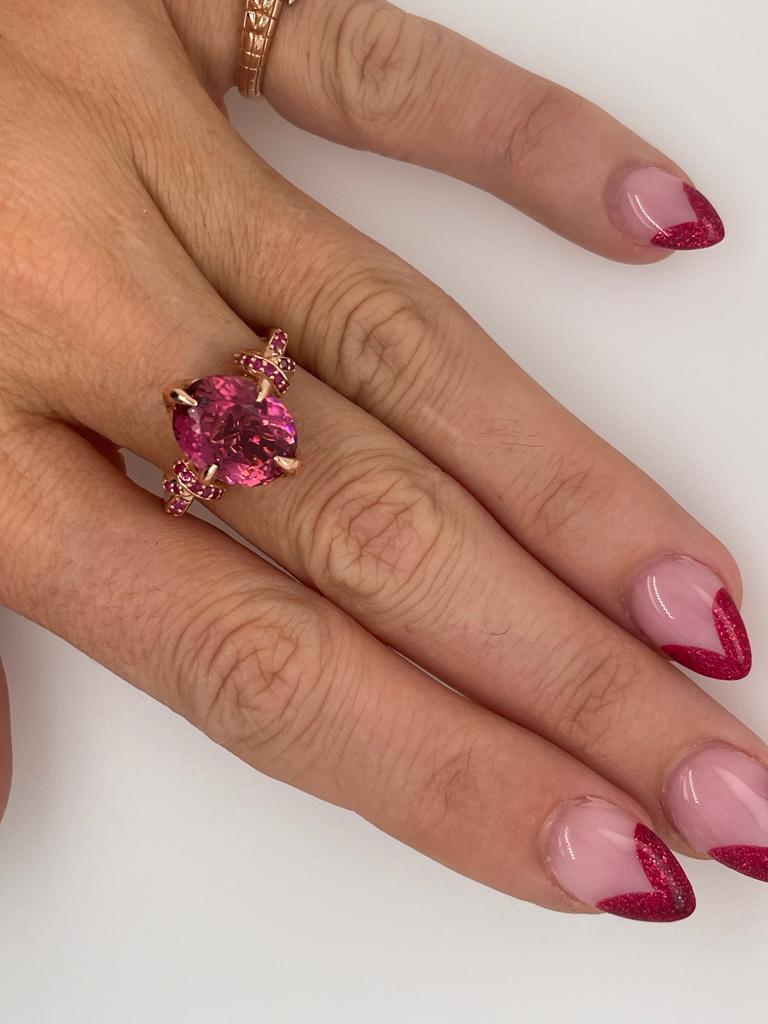 For Sale:  Pink Rubelite Tourmaline and Ruby Forget Me Knot Ring in 18ct Rose Gold 11