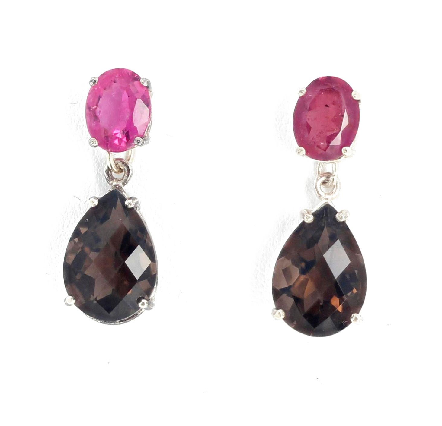 Brilliant matching pink natural (8mm x 6mm) Tourmalines (0.96 carats each) elegantly dangle glittering checkerboard gem cut pear shaped  natural Smoky Quartz ( 7 carats each - 18 mm x 14 mm) on these sterling silver stud earrings.  They dangle 1 1/8
