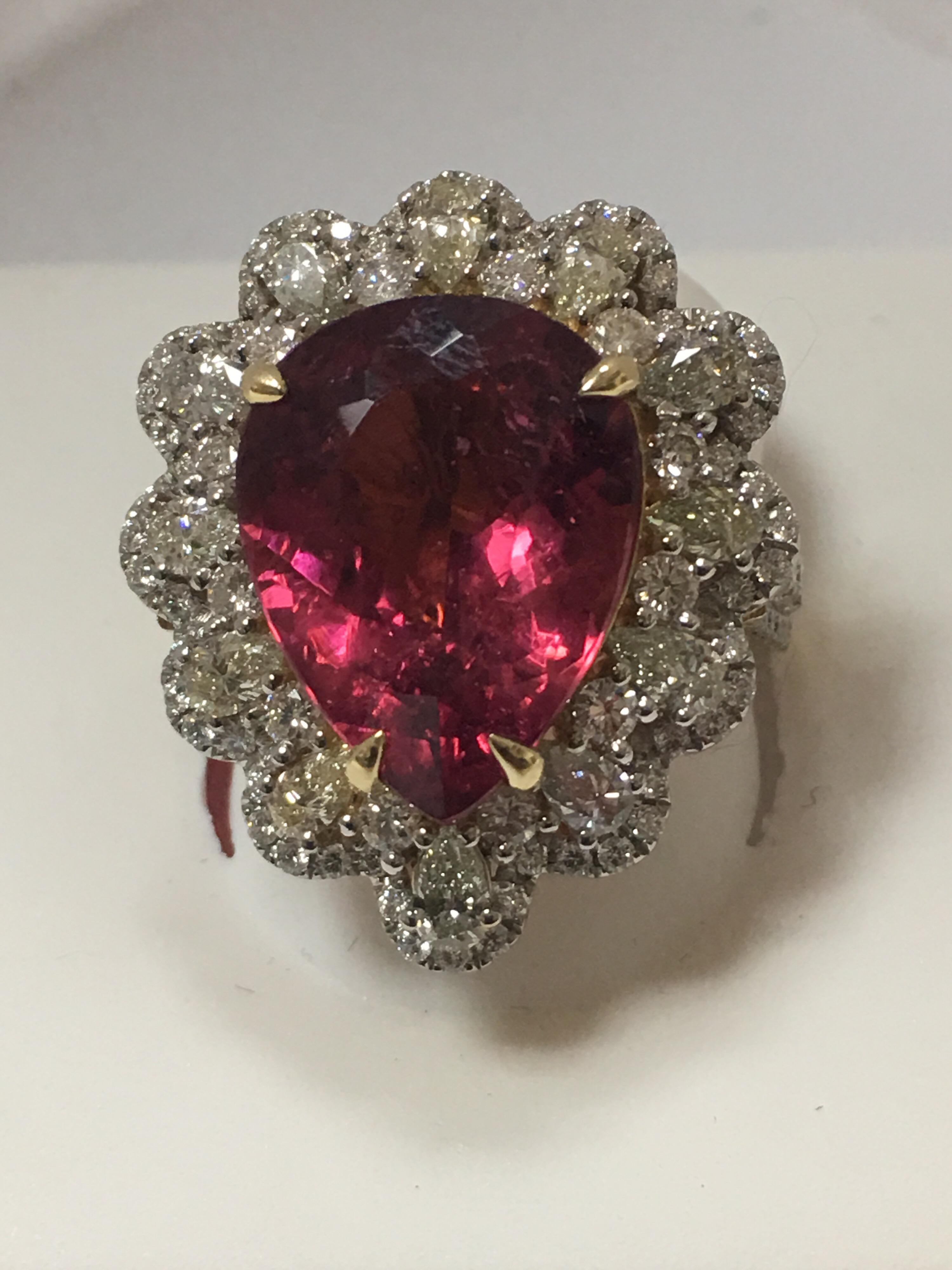 Natural Pink 8.45 Carat Pears shape Tourmaline and 2.16 Carat Diamond Ring Set In 14 Karat Yellow  is one of a kind handcrafted ring. The size of the ring is 7 and can be resized if needed.