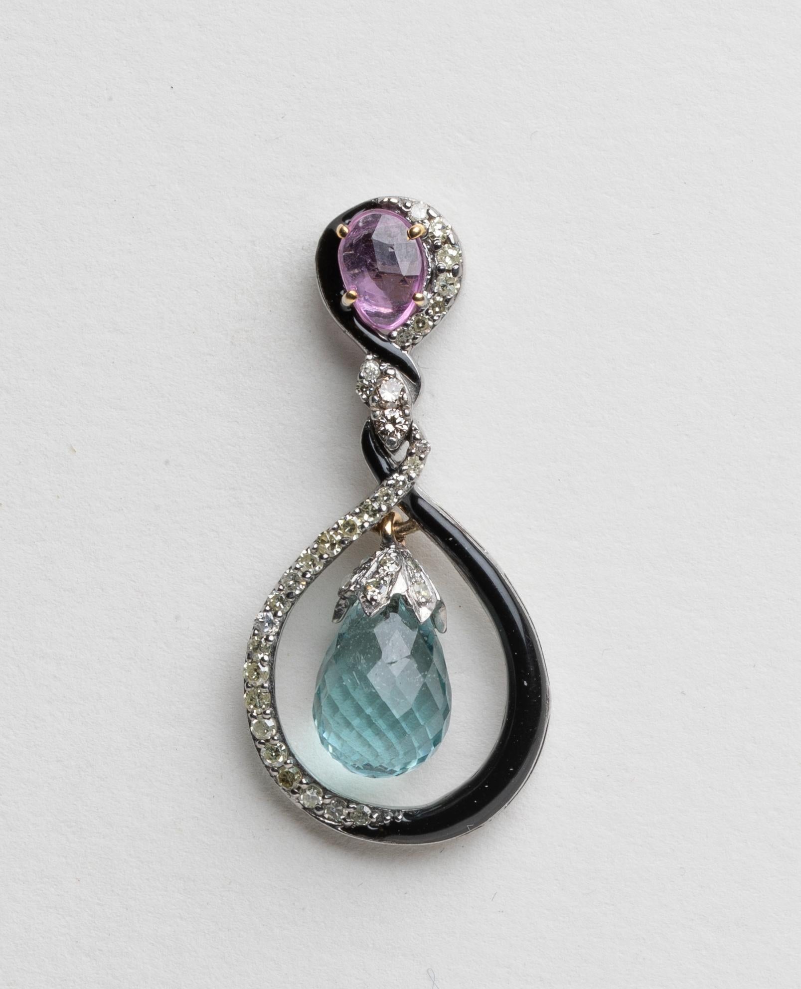 A pair of interlocking black onyx and pave`-set diamonds with faceted aquamarine briolette in the center with a diamond end cap; and a faceted pear-shaped pink tourmaline at the top.  18K gold post for pierced ears.  Aquamarine is 4.10 carats;