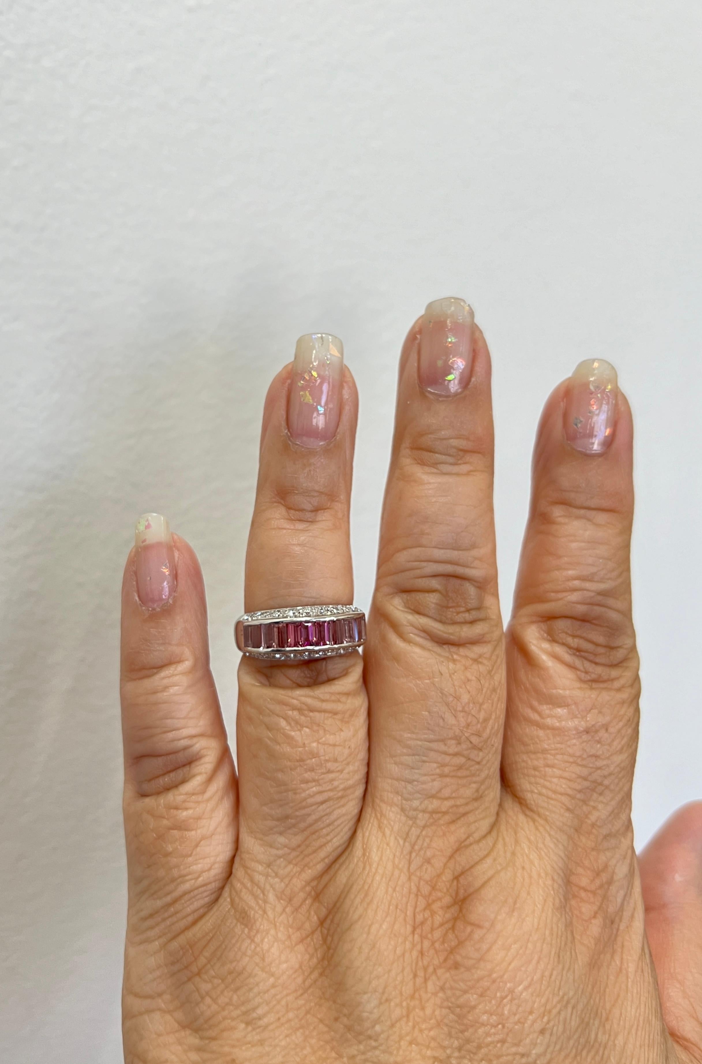 Beautiful 1.53 ct. pink tourmaline baguettes with 0.41 ct. good quality white diamond rounds.  Handmade in platinum.  Ring size 6.75.