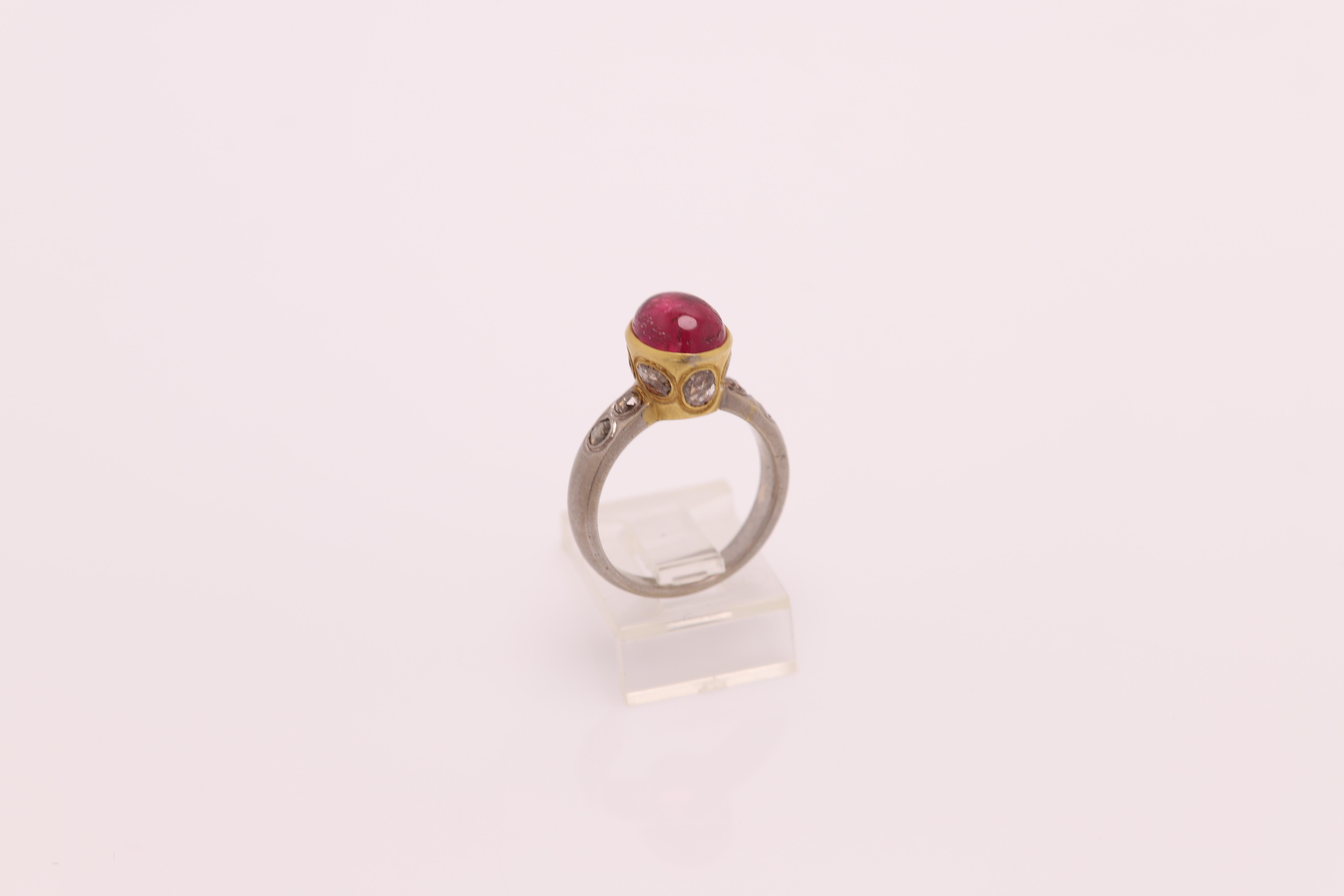 NEW 
Vintage Pink Tourmaline Ring - Hand Made in Italy
18k Two Tone Gold 6.7 grams - mat finish (not shiny gold)
Oval cabochon Pink Tourmaline  2.90 ct (10x8 mm)
Plus old -cut Diamonds Champagne/Light Brown 1.10 carat
Finger size 7
All stones are