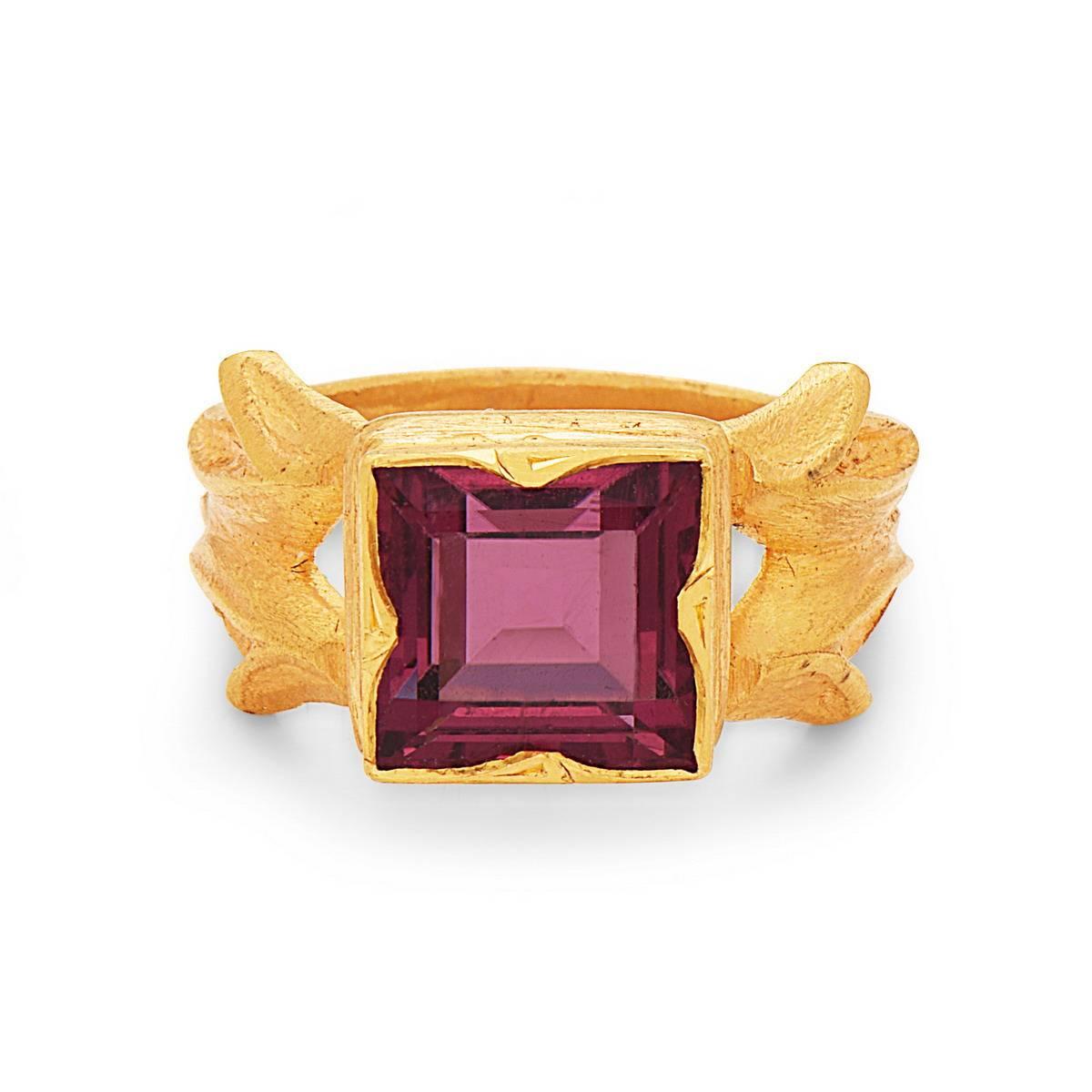 Super stunning princess cut Pink Tourmaline Ring in 22K yellow Gold with hand carved shank. 

Ring Size: 6 ( can be sized )

22kt: 8.12gms
Pink Tourmaline: 4.25cts


