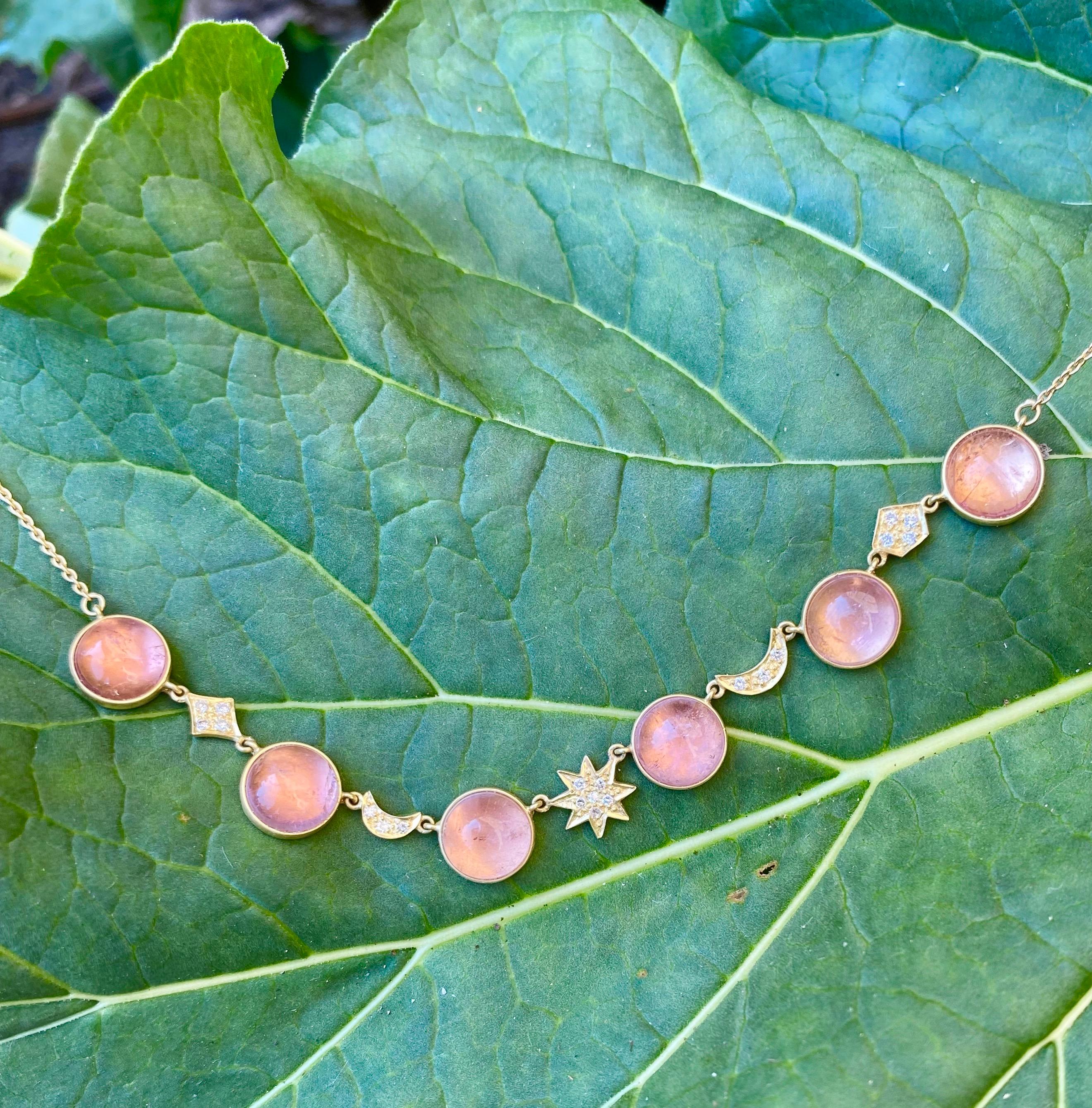 Designed by award winning designer, Lauren Harper, this Pink Tourmaline and Diamond necklace glows with warm pink tones and is set in 18kt yellow gold. The 18kt gold chain is adjustable, 14.5 to 16.5 inches with an 18kt Gold Lobster claw clasp at