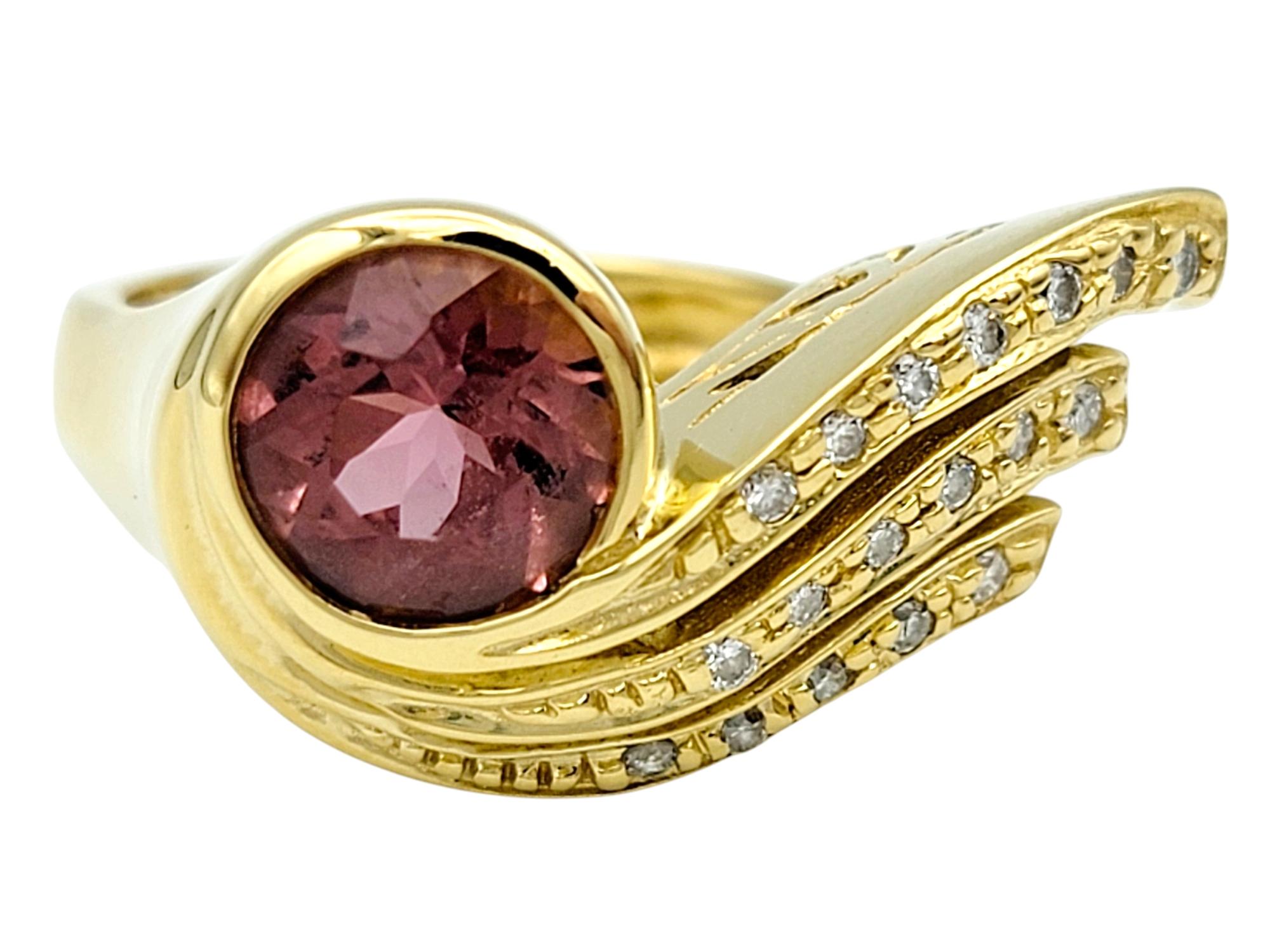 Ring Size: 6

Exude timeless elegance with this captivating pink tourmaline and diamond cocktail ring. At its heart, a vibrant round-cut pink tourmaline radiates warmth and sophistication, its luscious hue evoking the beauty of blooming roses.