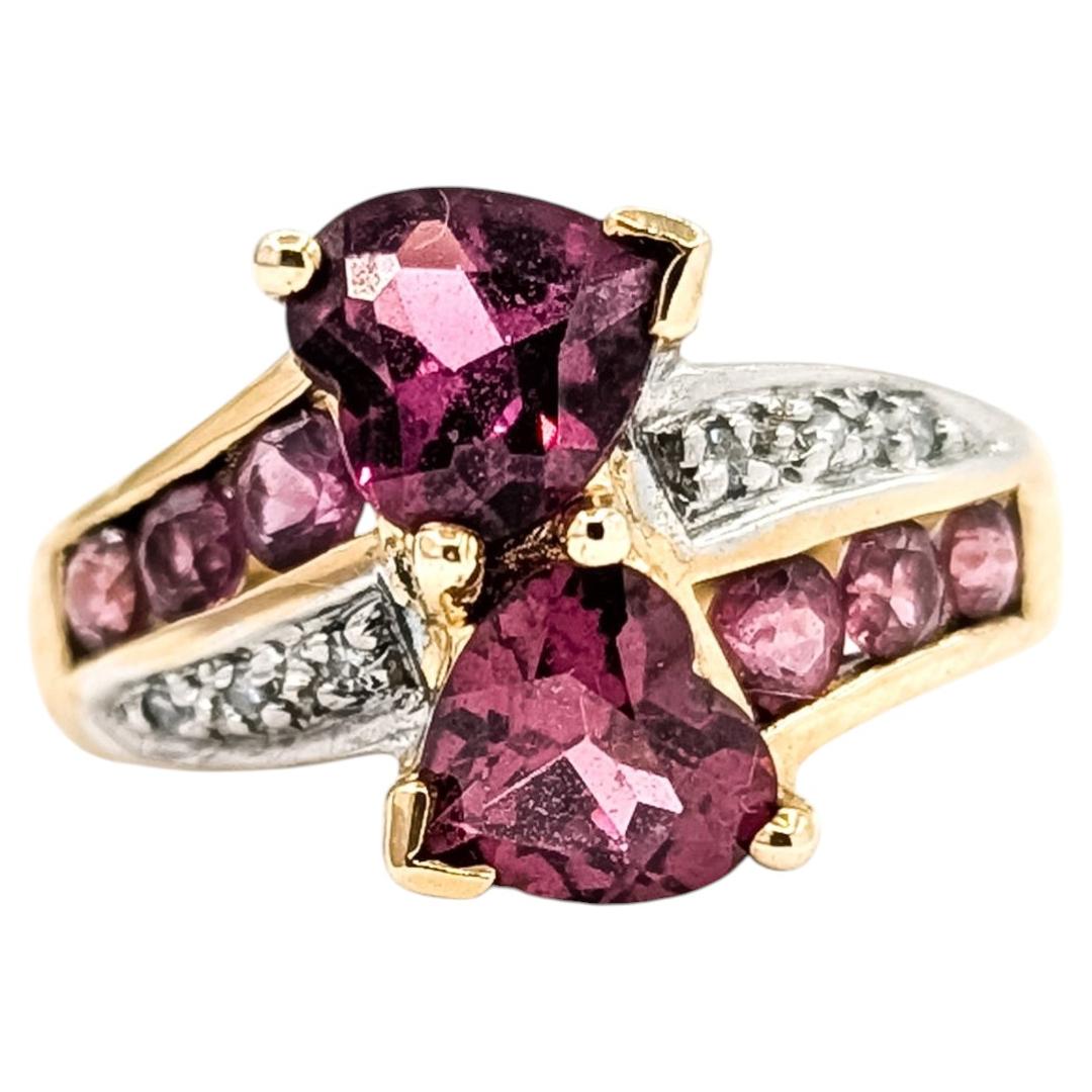 Anillo «bypass» de turmalina rosa y diamantes en oro amarillo de 10k