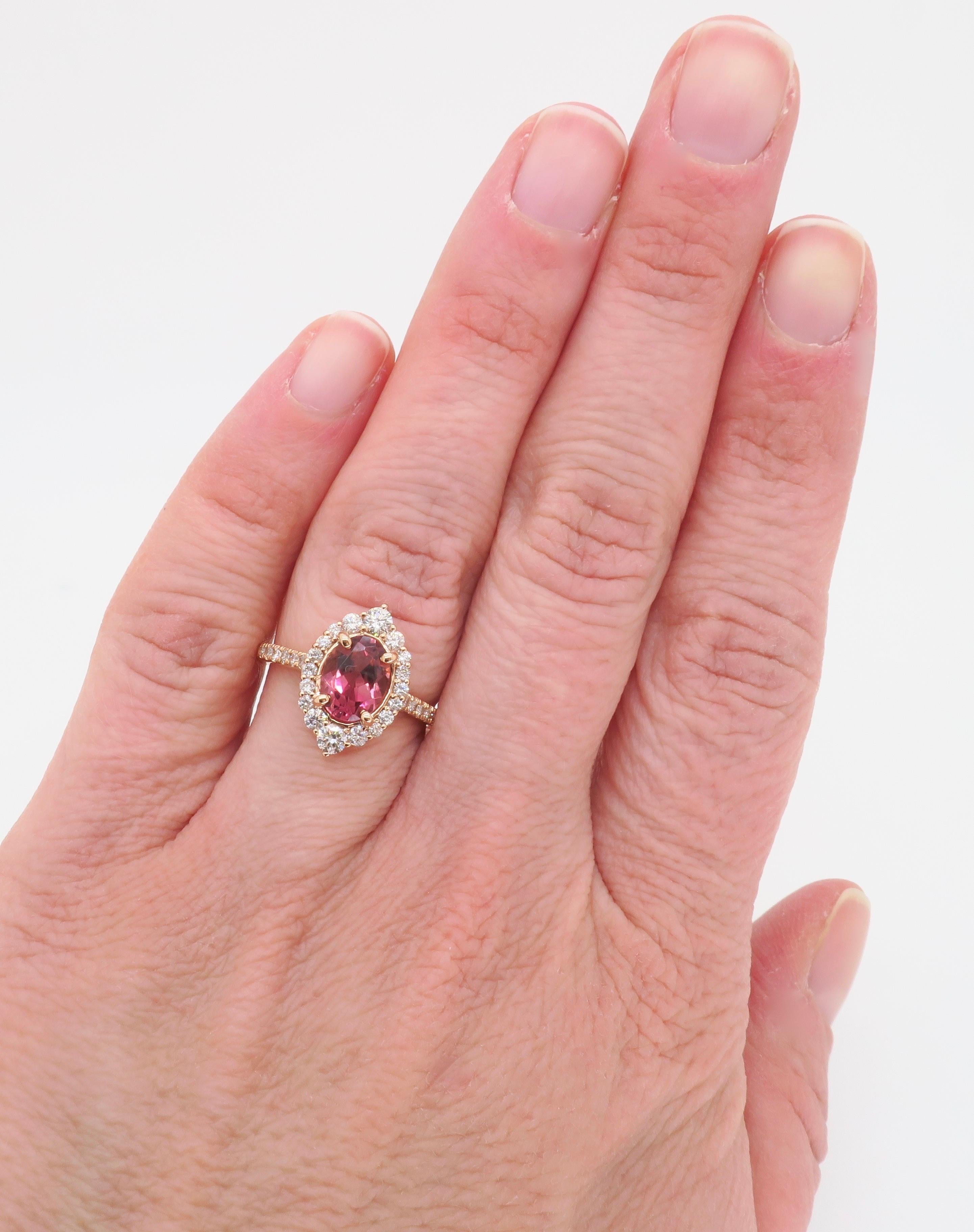 Pink Tourmaline & diamond halo ring made with a 1.18ct Pink Tourmaline, and .50ctw of Diamonds. 

Gemstone: Pink Tourmaline & Diamond
Diamond Carat Weight: .50CTW
Diamond Cut: Round Brilliant Cut  Diamonds
Pink Tourmaline Carat Weight: