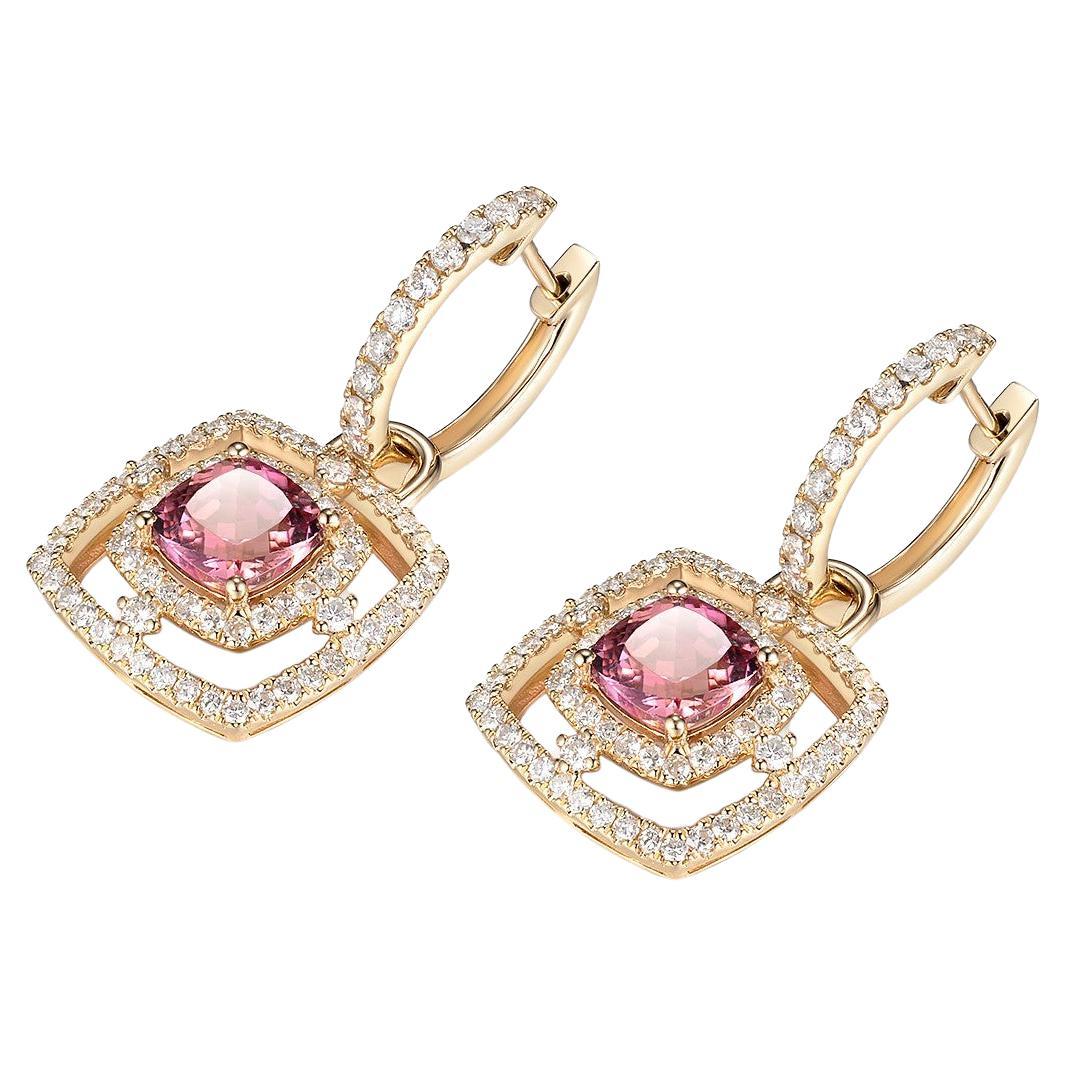 These exquisite earrings are adorned with two stunning cushion-cut pink tourmaline gemstones, each weighing 2.02 carats. The tourmalines showcase a beautiful pink hue, radiating elegance and charm. They are complemented by the brilliance of 1.05