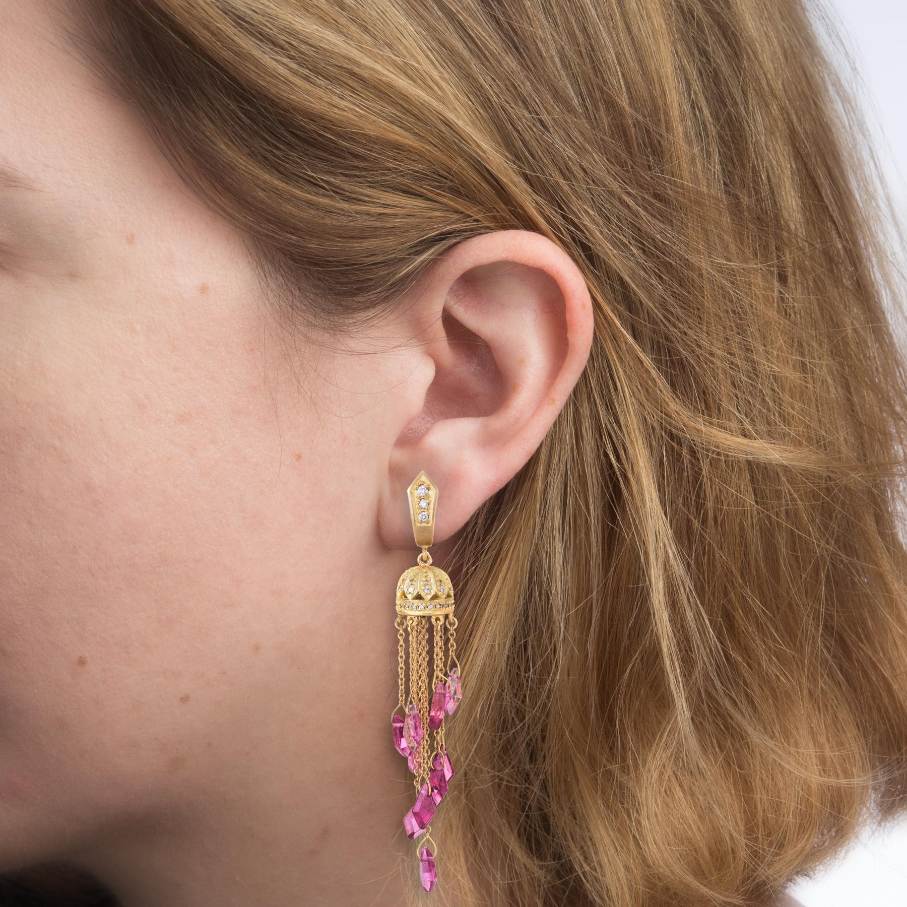 Finely detailed pair of pink tourmaline & diamond earrings, crafted in 18k yellow gold. 

Triangular table cut pink tourmalines measures 5mm x 4mm and total an estimated 2 carats, accented with an estimated 0.50 carats of diamonds (estimated at G-H