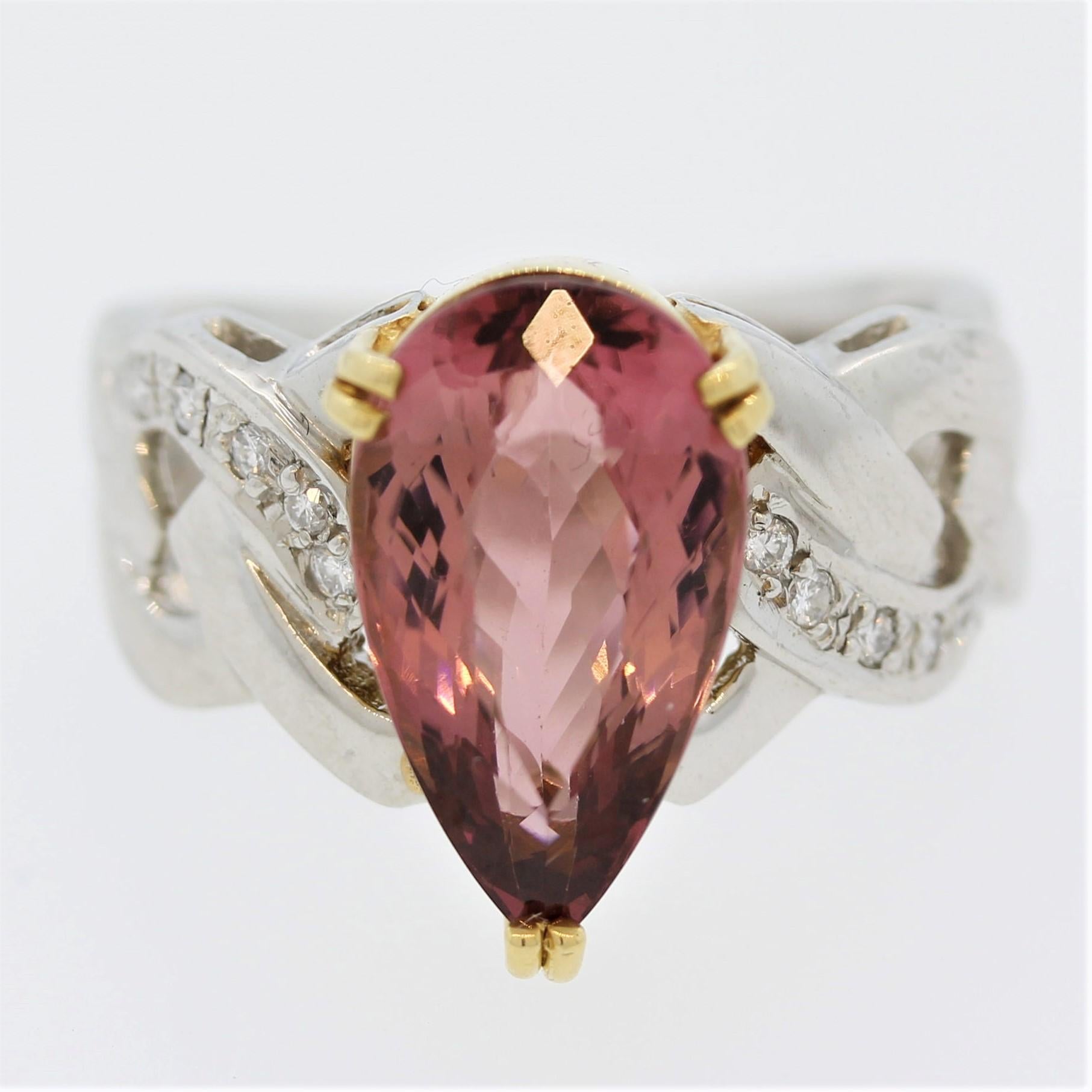 An elegant ring featuring a 5.12 carat pink tourmaline. It is cut as a pear shape and has a sweet soft color. It is accented by 0.10 carats of round brilliant cut diamonds set on the sides of the ring. Made in platinum and 18k yellow gold, this ring